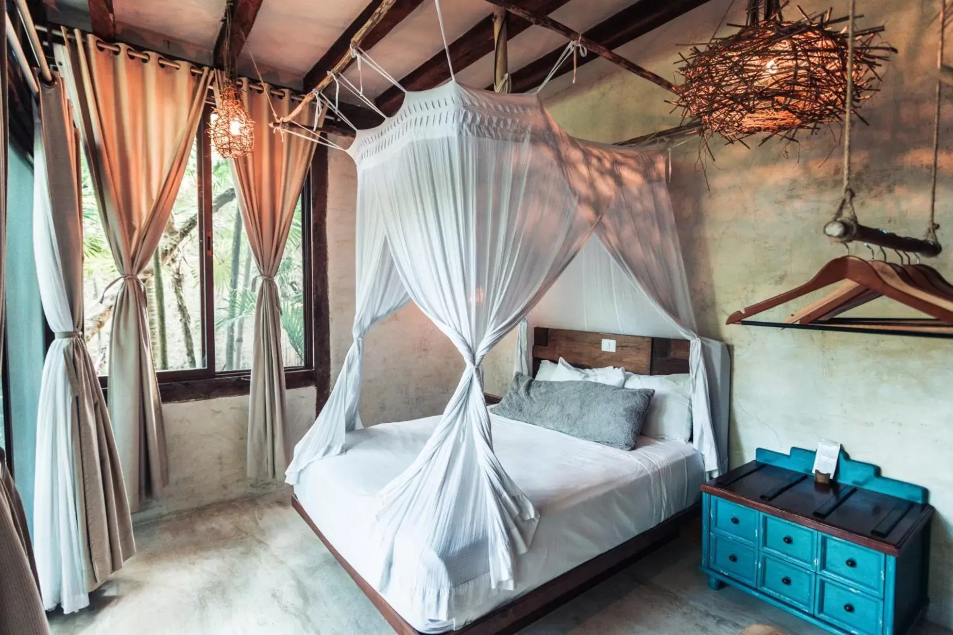 Bed in Hidden Treehouse Tulum Eco-Hotel