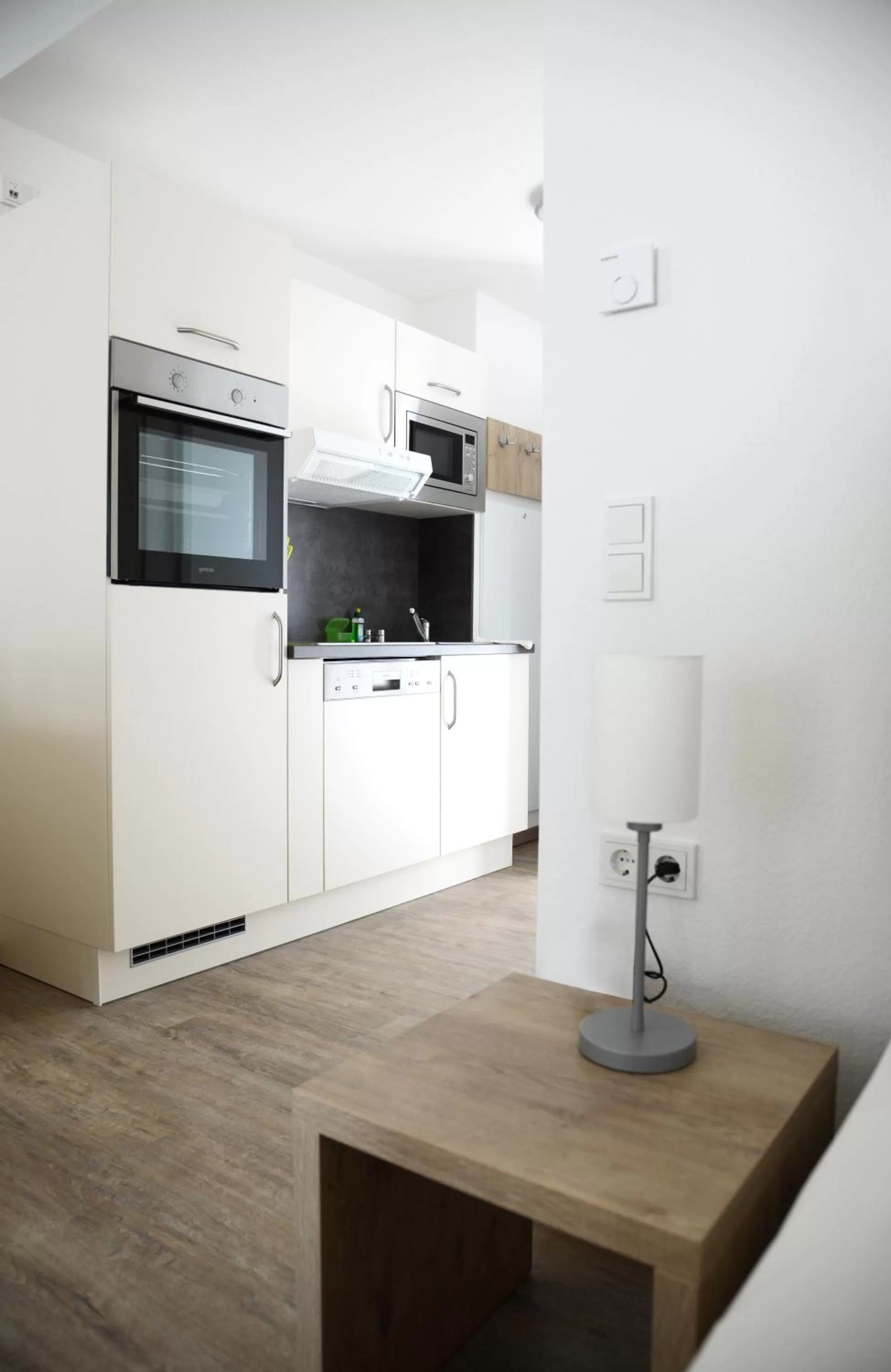 Kitchen or kitchenette in ADAPT APARTMENT HOTEL Giessen