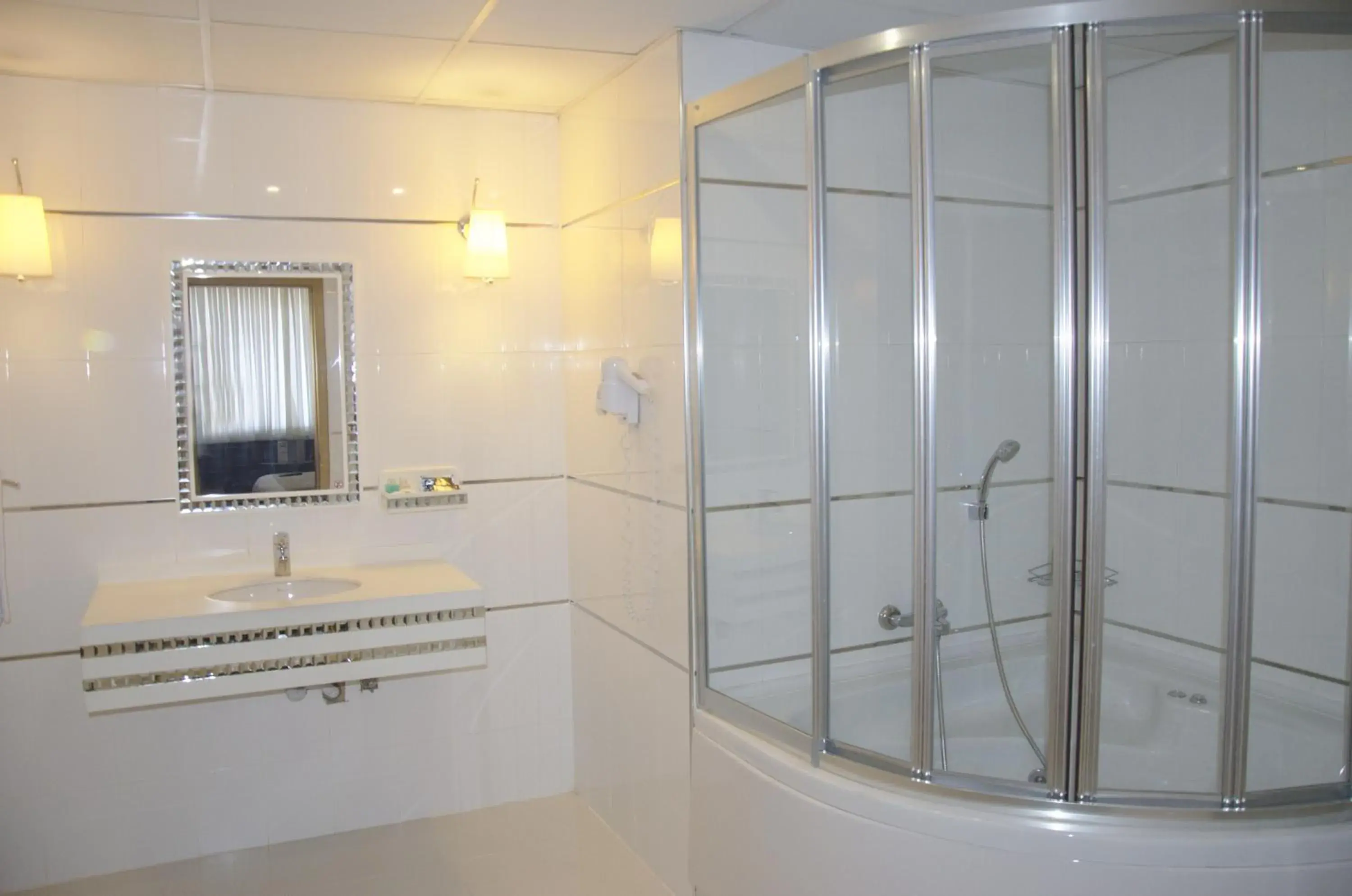 Photo of the whole room, Bathroom in Hotel Tilmen