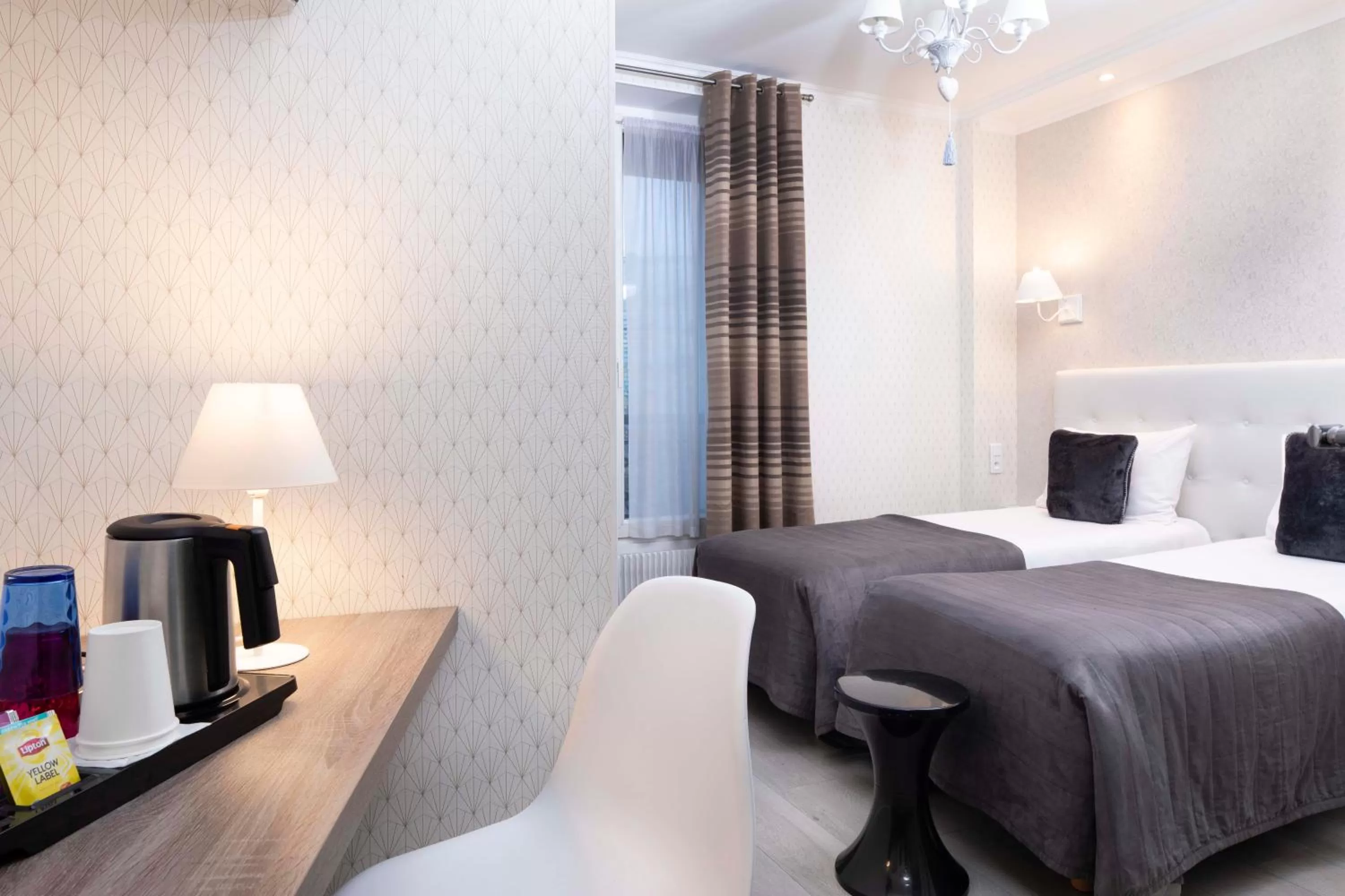 Bed in Hôtel de Genève