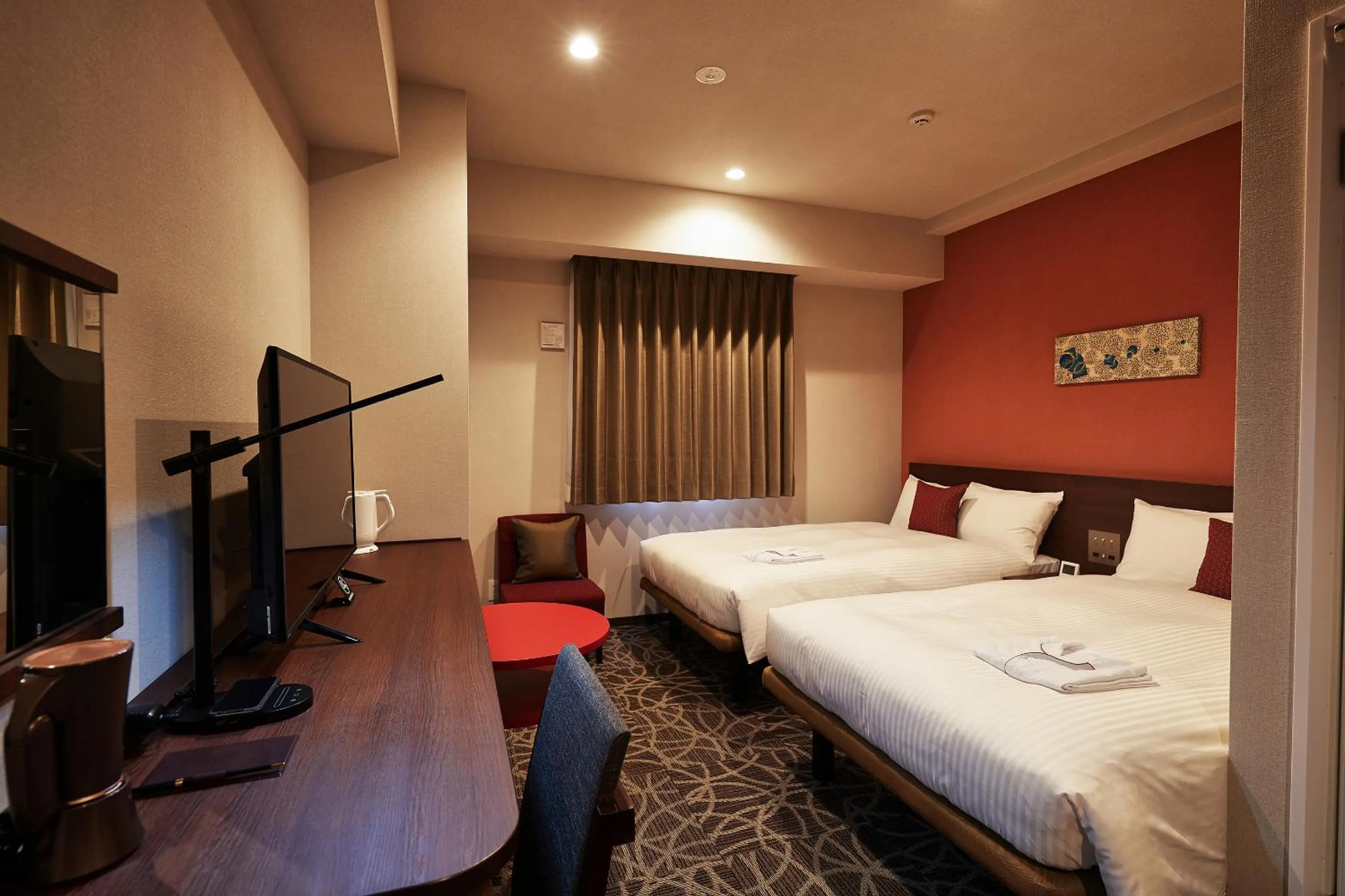 Bed in Y's Inn Naha Oroku Ekimae