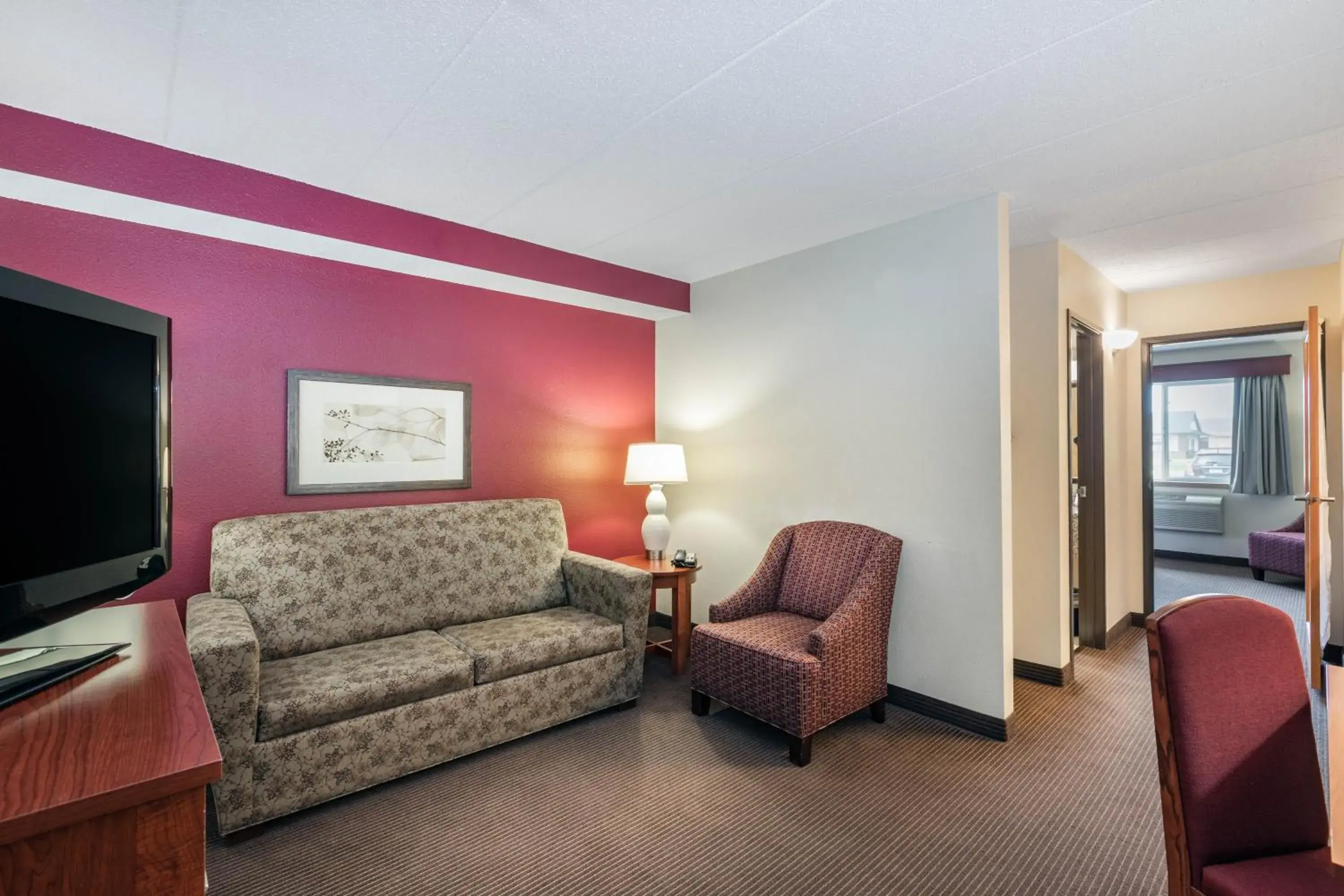 Communal lounge/ TV room, Seating Area in SureStay Plus Hotel by Best Western Litchfield