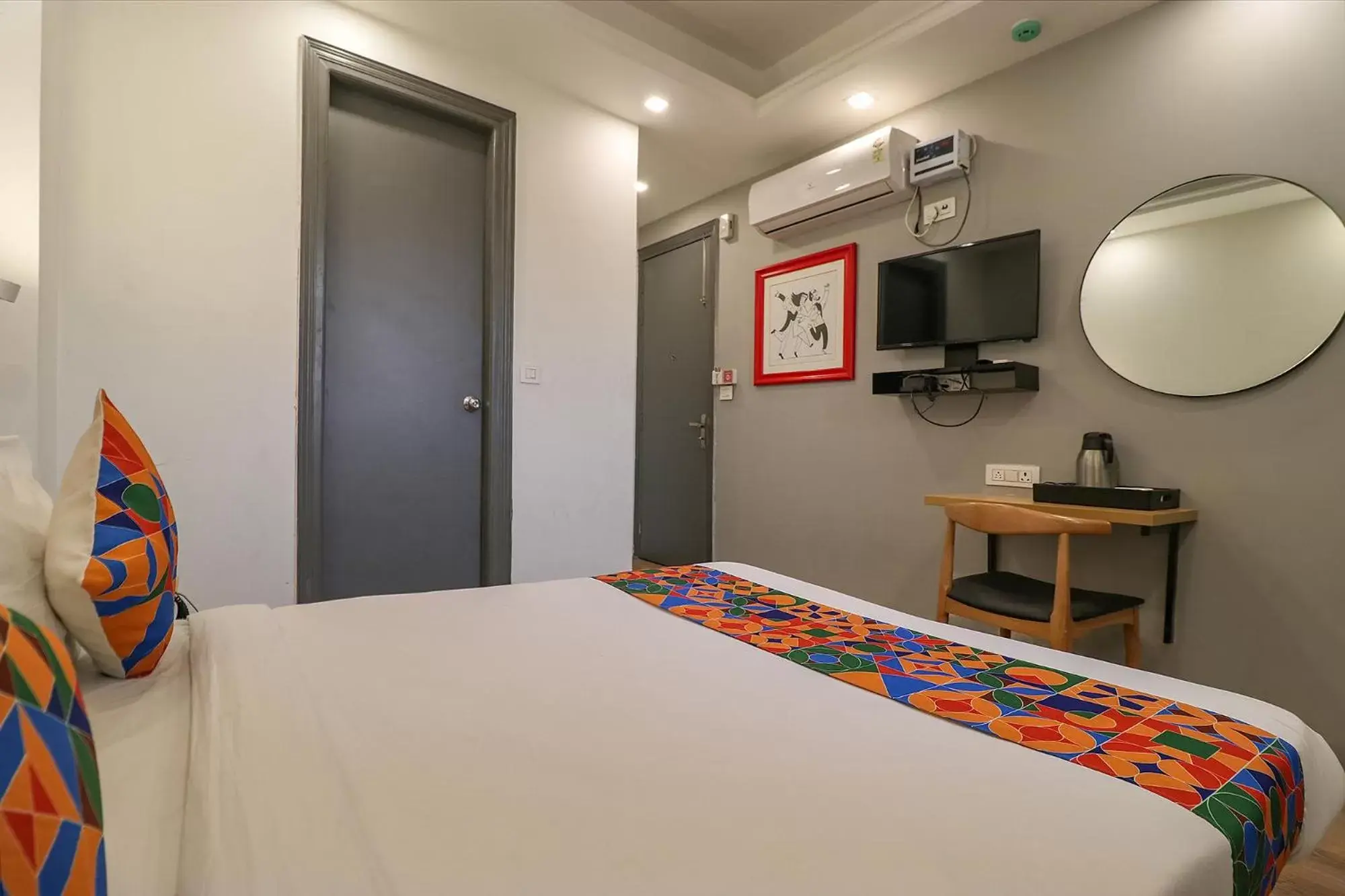 TV and multimedia, Bed in FabHotel The Chaitanyas Rohini sec 18 TV and multimedia, Bed in FabHotel The Chaitanyas Rohini sec 18