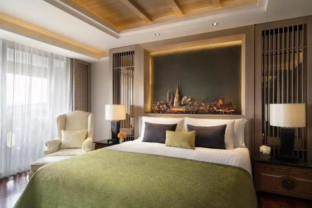 Bed in Anantara Riverside Bangkok Resort