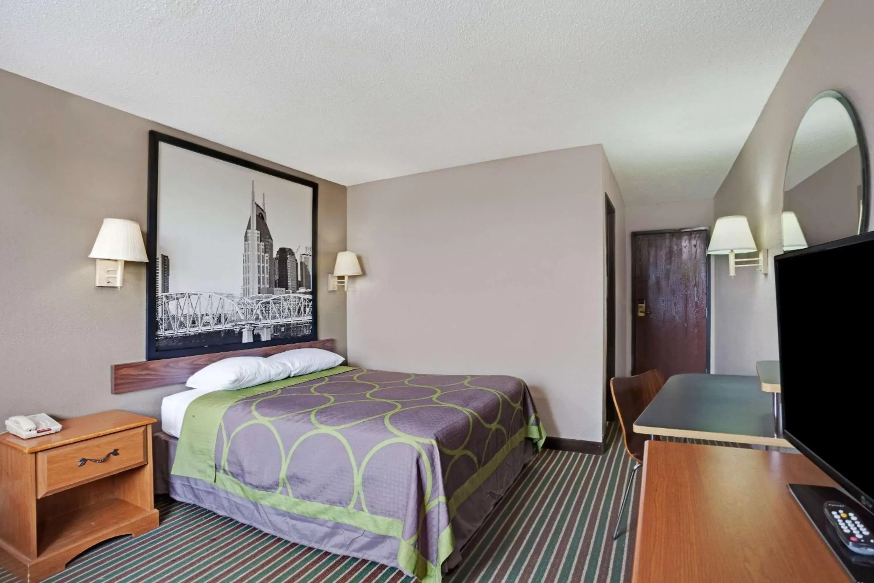 Photo of the whole room, Bed in Super 8 by Wyndham Nashville/ Dntn/ Opryland Area