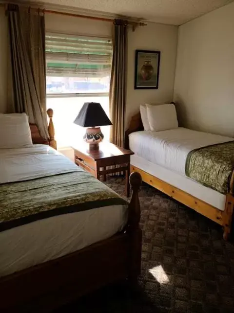 Bed in Lee's Ferry Lodge at Vermilion Cliffs