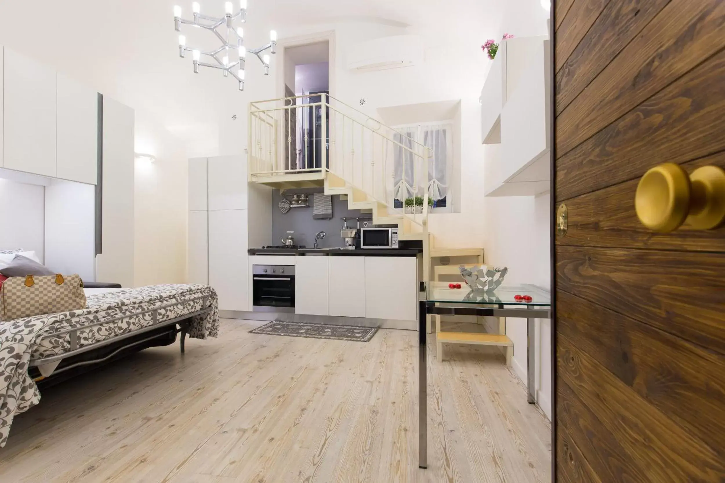 Bedroom, Kitchen/Kitchenette in Navona Open Space Apartments