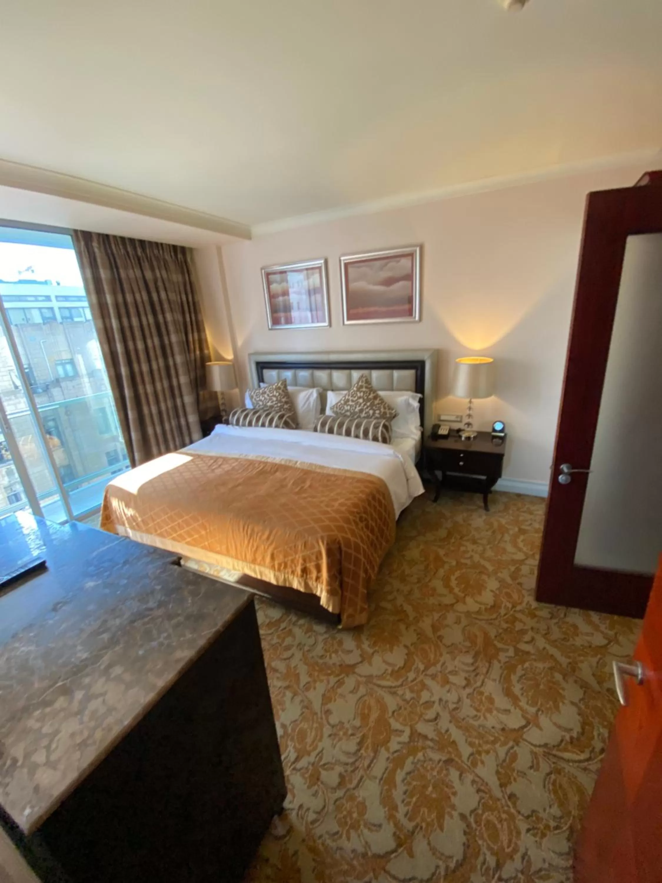 Bed in Taj Executive Suites, Private Residence