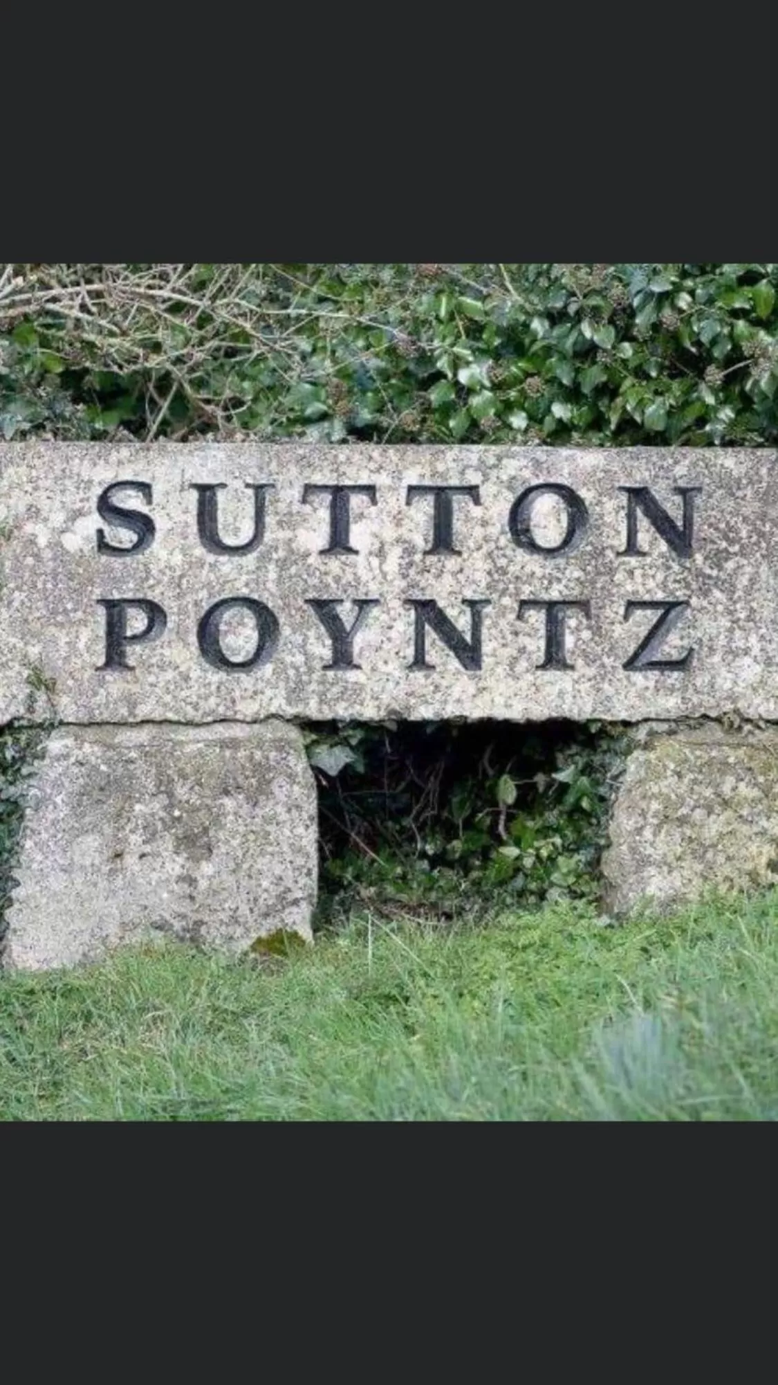 Property Logo/Sign in Blue Shutters