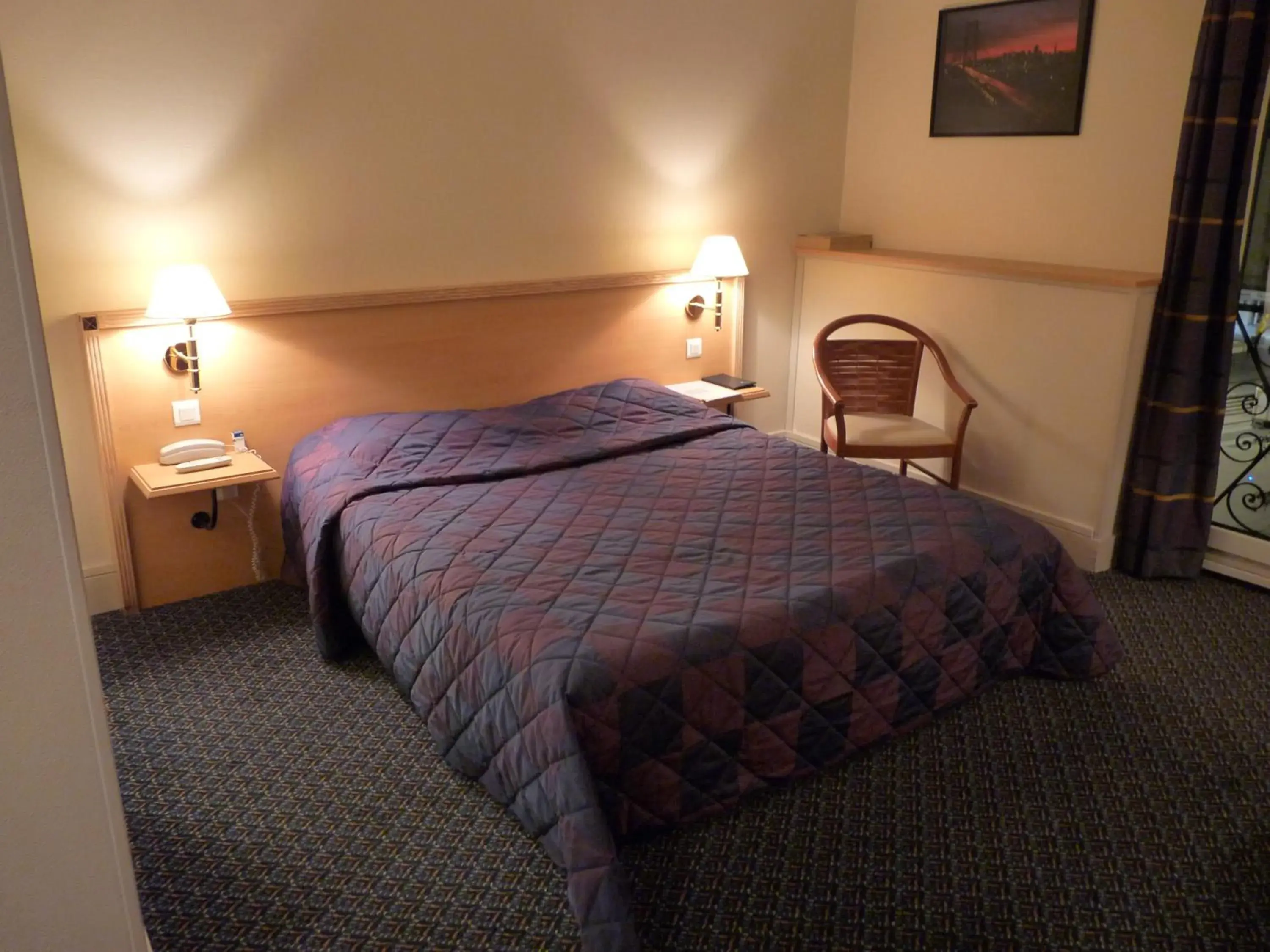 Bed in Hotel Le Bourbon Pau Centre