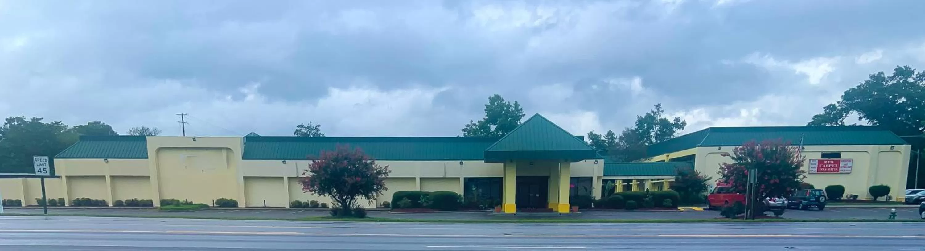 Property building in Red Carpet Inn Kinston