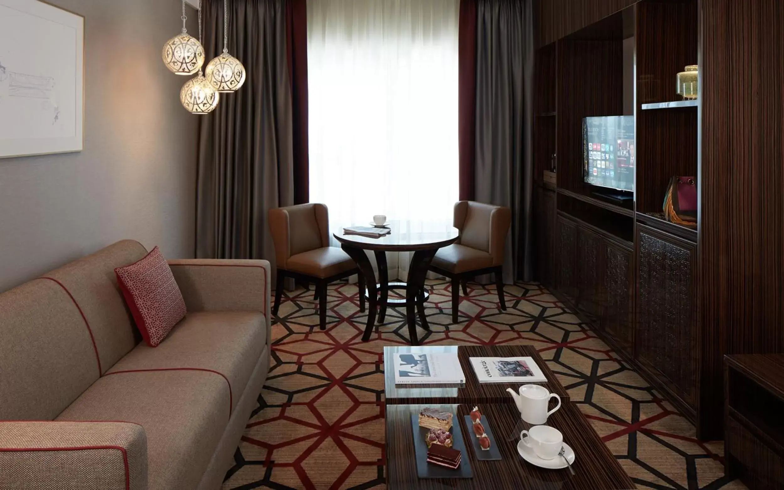 TV and multimedia, Seating Area in Dusit D2 Kenz Hotel Dubai