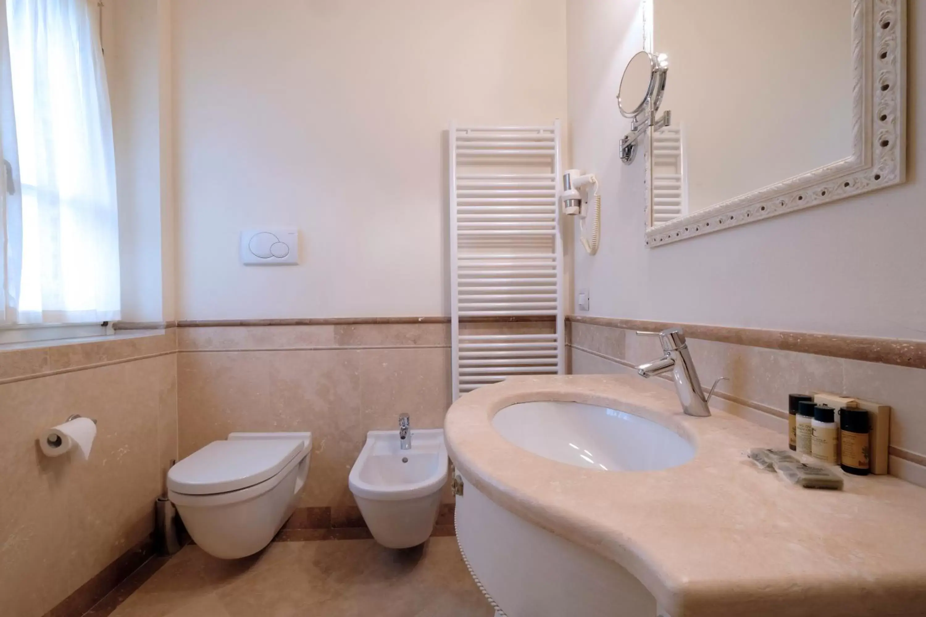 Bathroom in Garda Apartments San Vigilio Golf Bathroom in Garda Apartments San Vigilio Golf