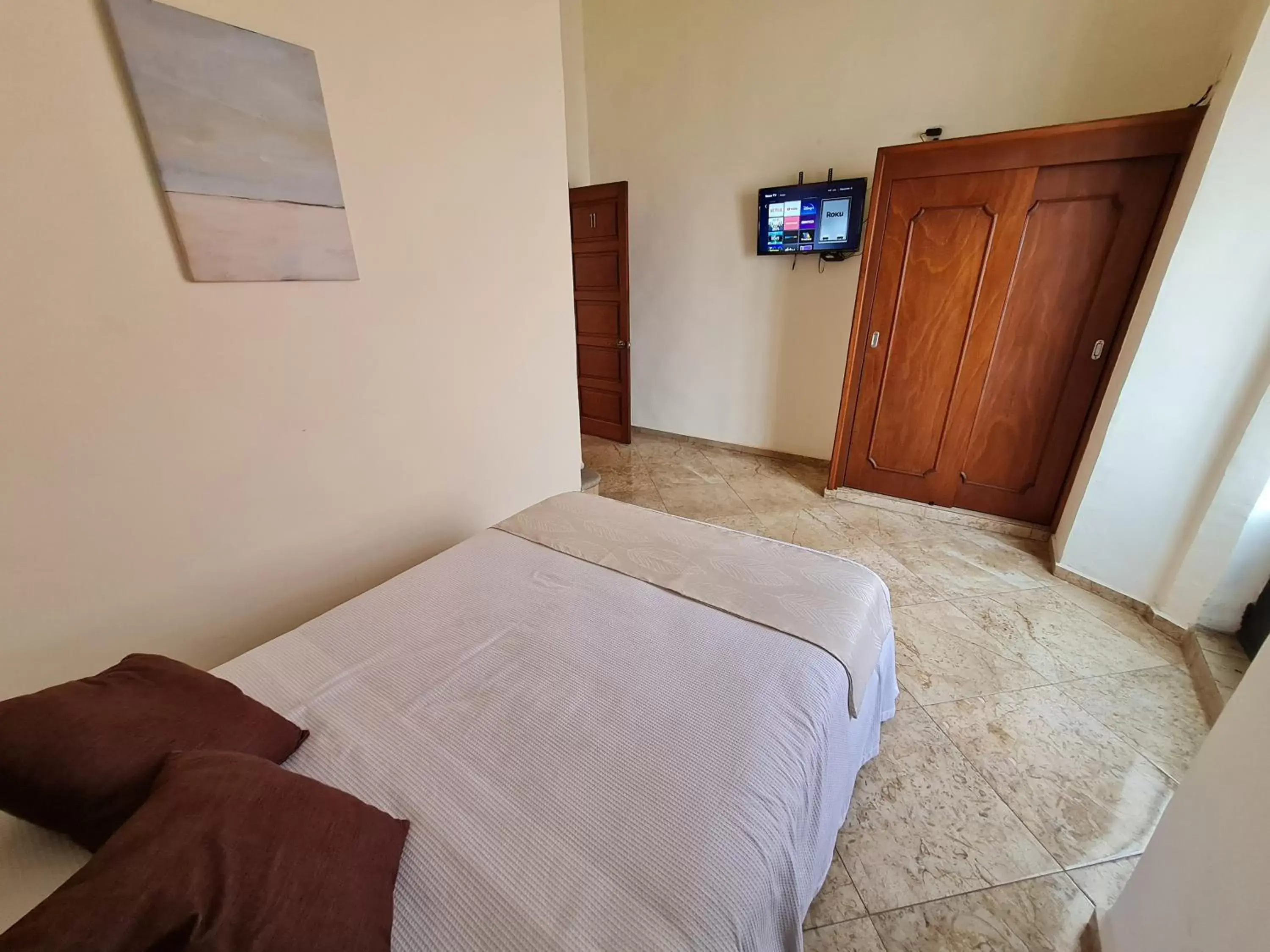 Communal lounge/ TV room, Bed in Hotel Catedral