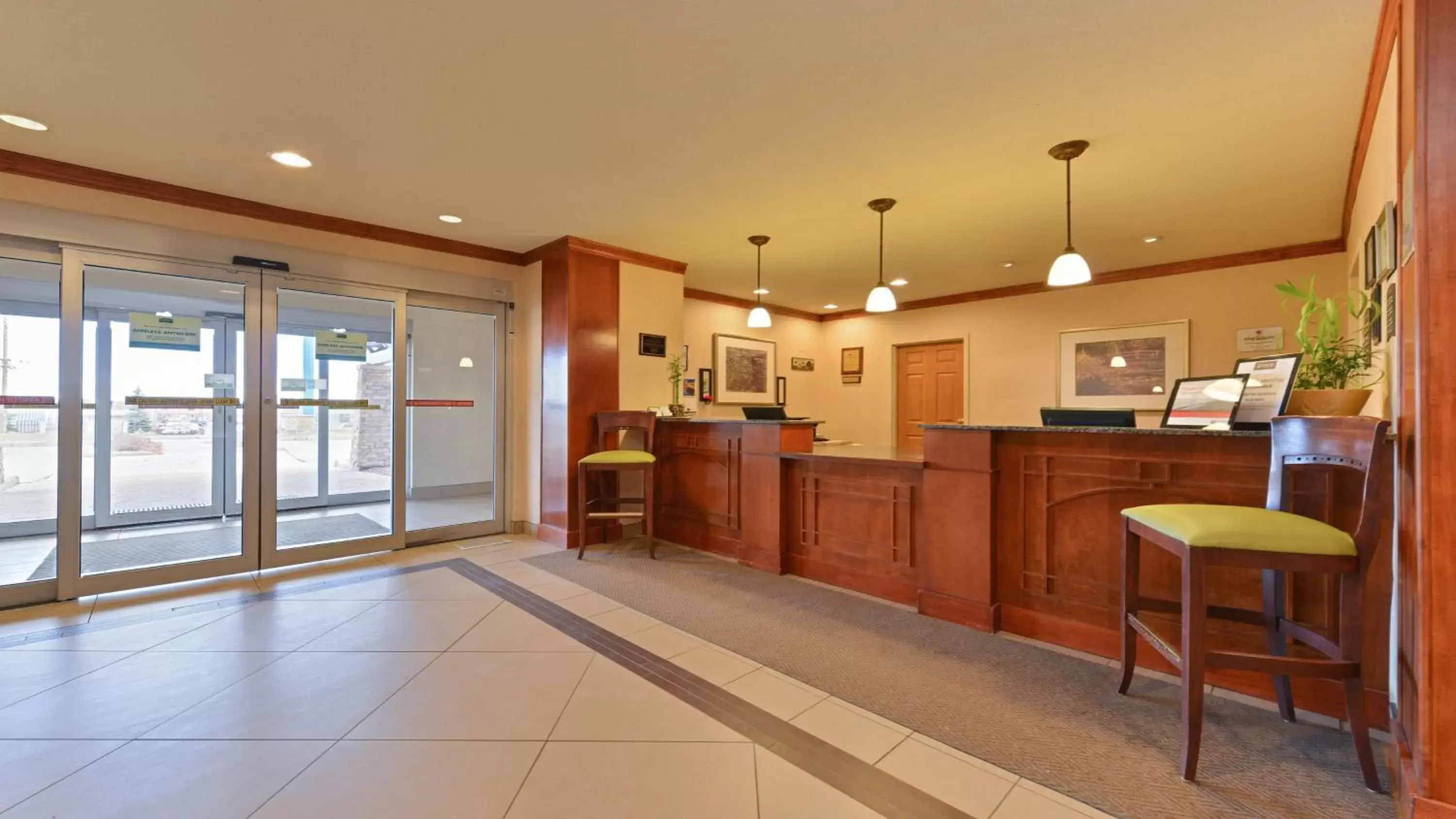 Property building, Lobby/Reception in Staybridge Suites - Calgary Airport, an IHG Hotel