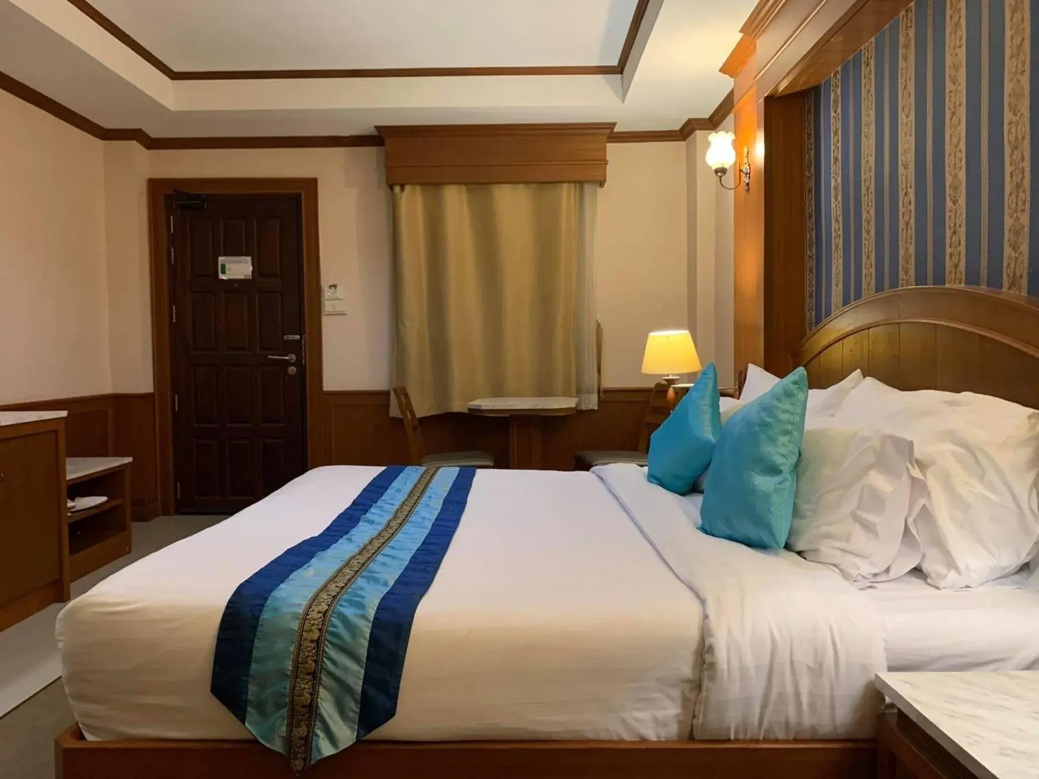 Bed in The Lion King Hotel Udonthani Bed in The Lion King Hotel Udonthani