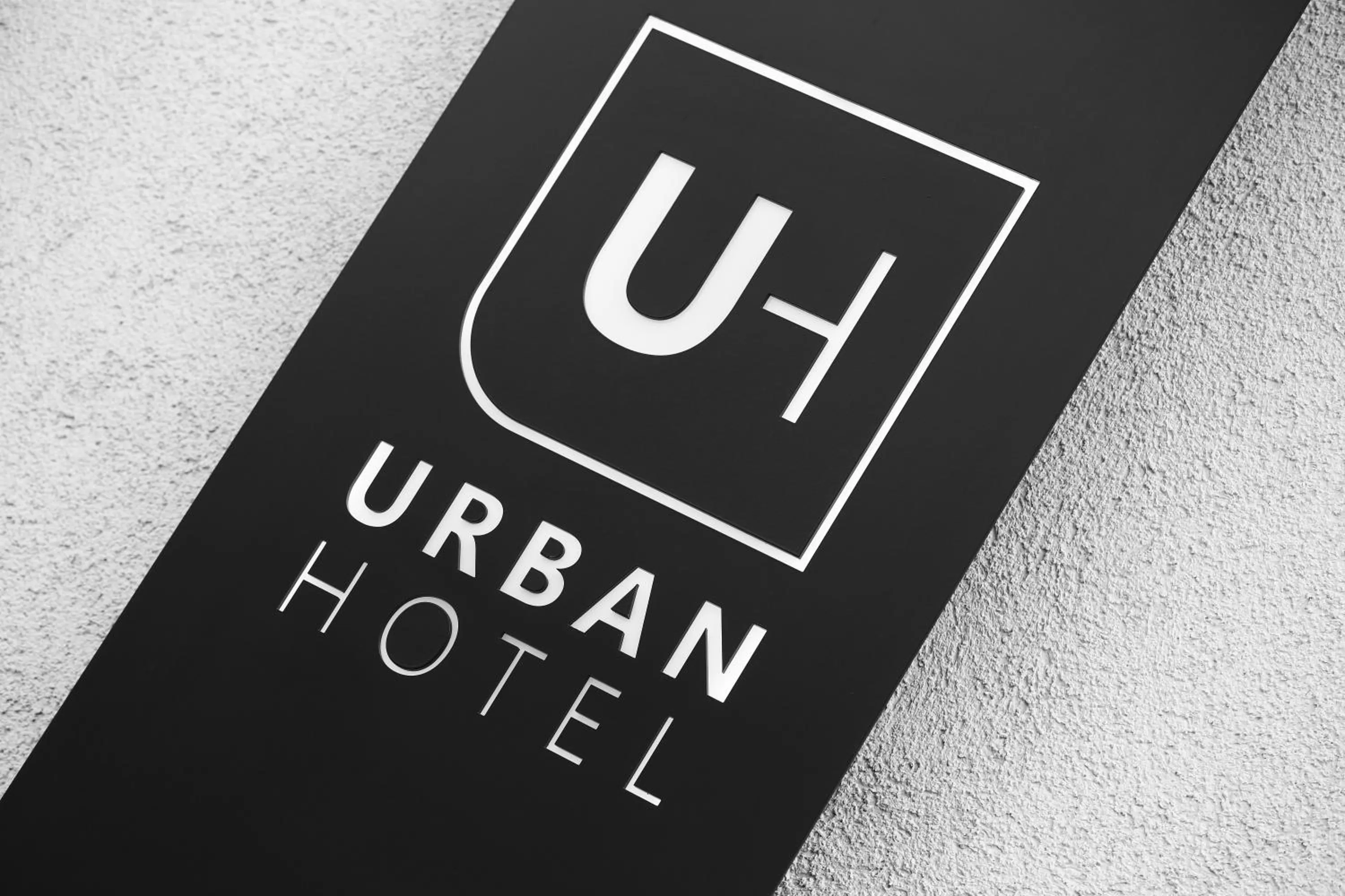 Property logo or sign in Urban Boutique Hotel Center