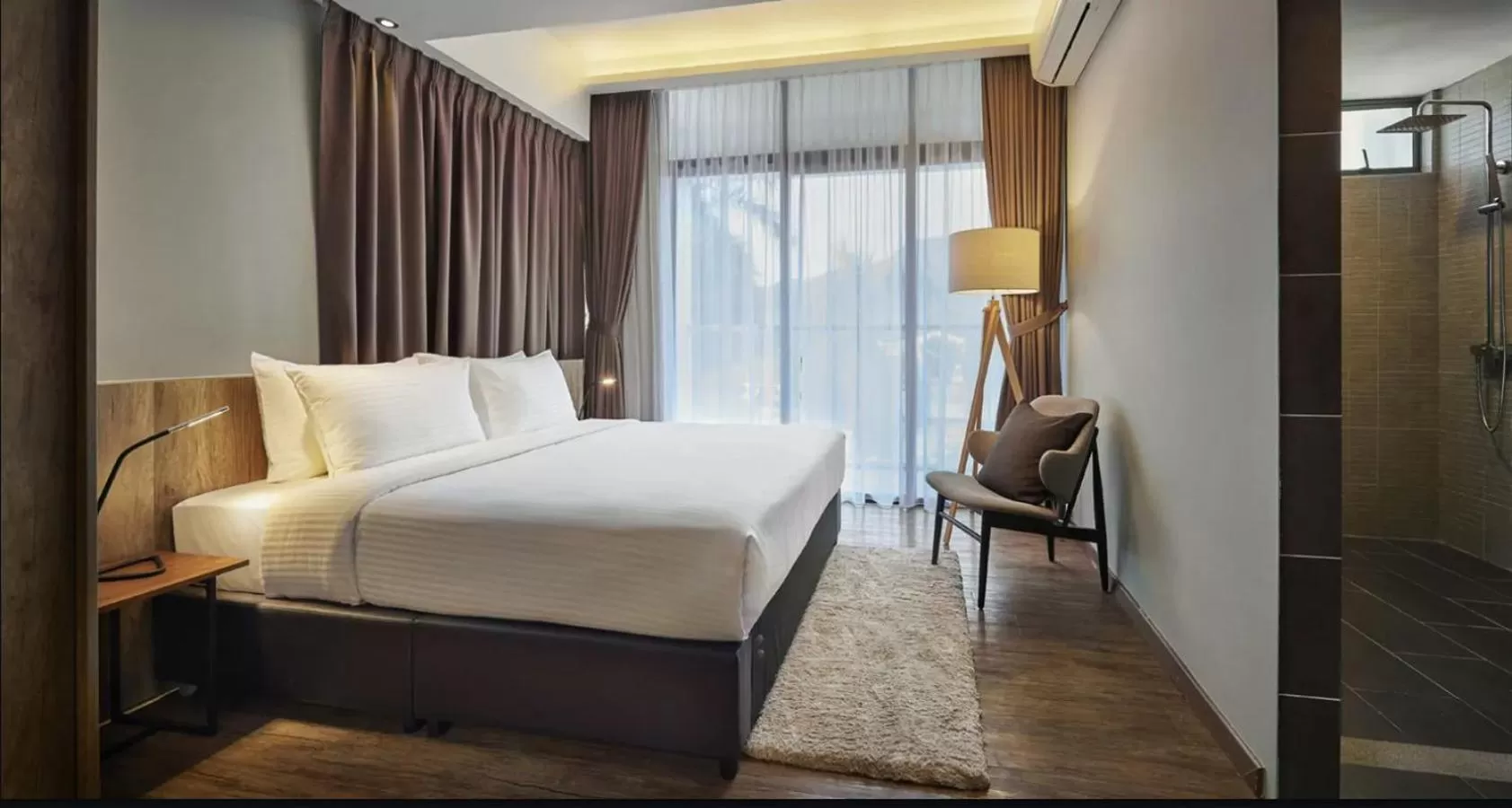 Bed in Tropics Eight Suites