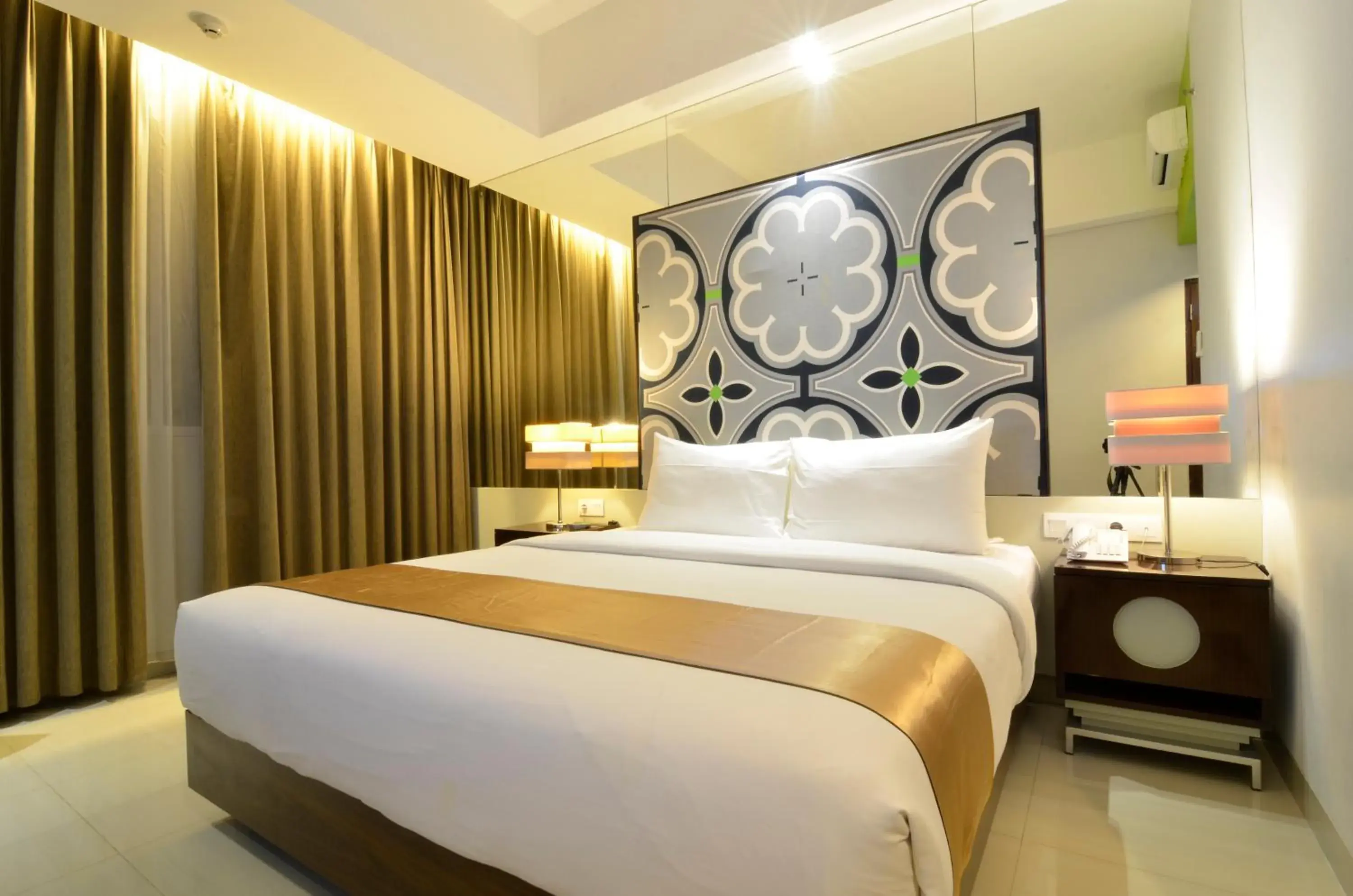 Bed in Howard Johnson By Wyndham Pekalongan