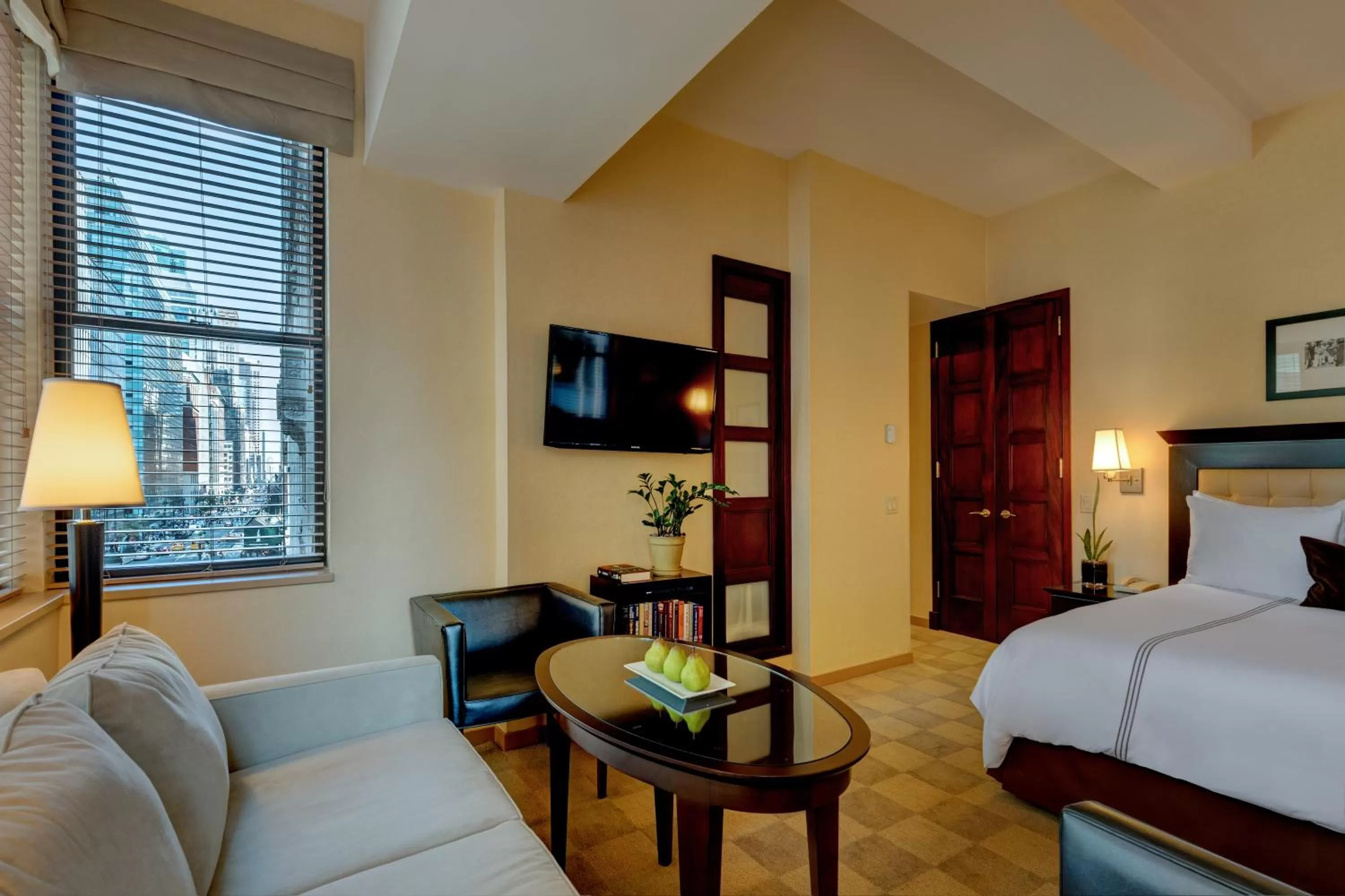 Communal lounge/ TV room, Bed in Library Hotel by Library Hotel Collection