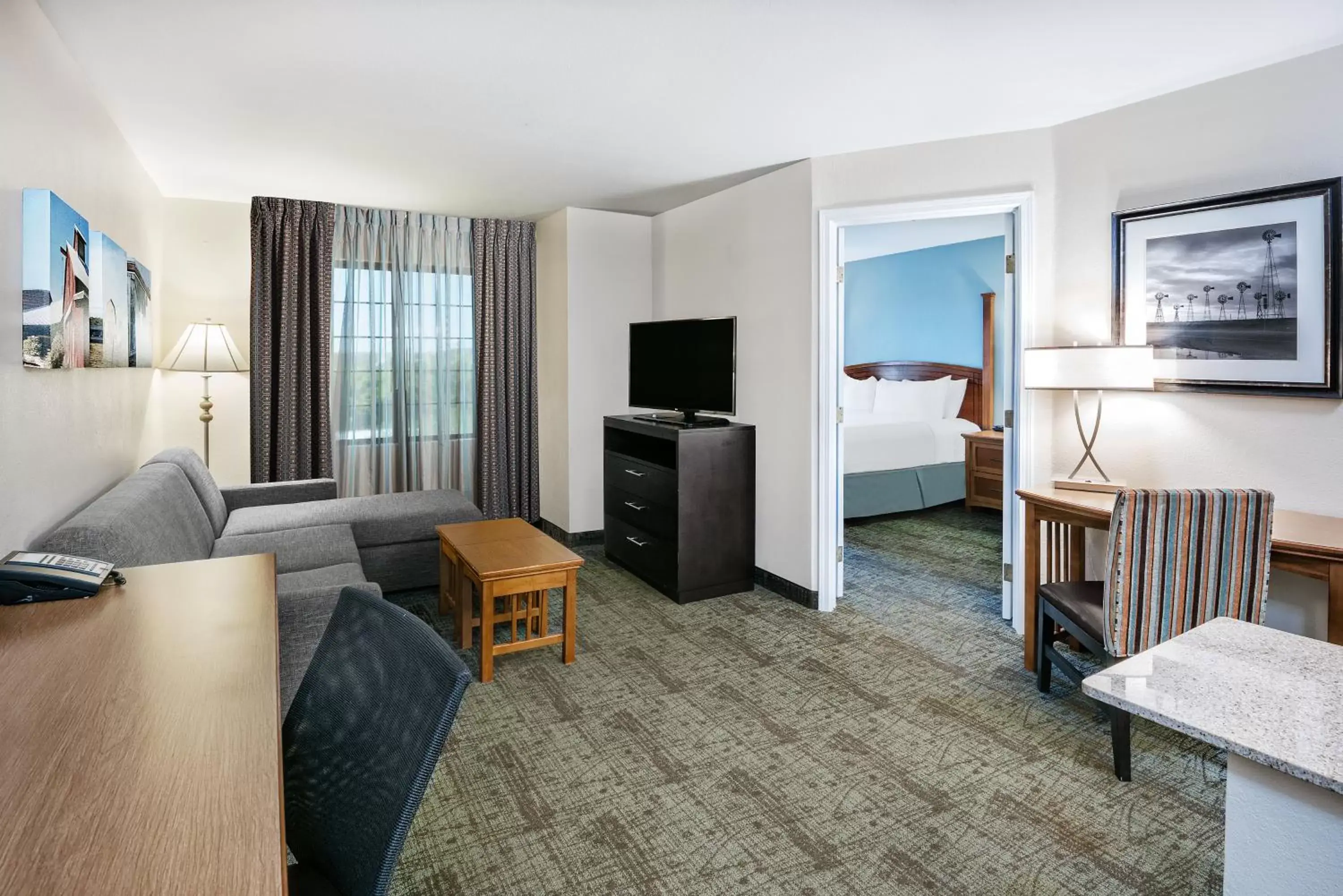 Bedroom, Seating Area in Staybridge Suites Austin Round Rock, an IHG Hotel