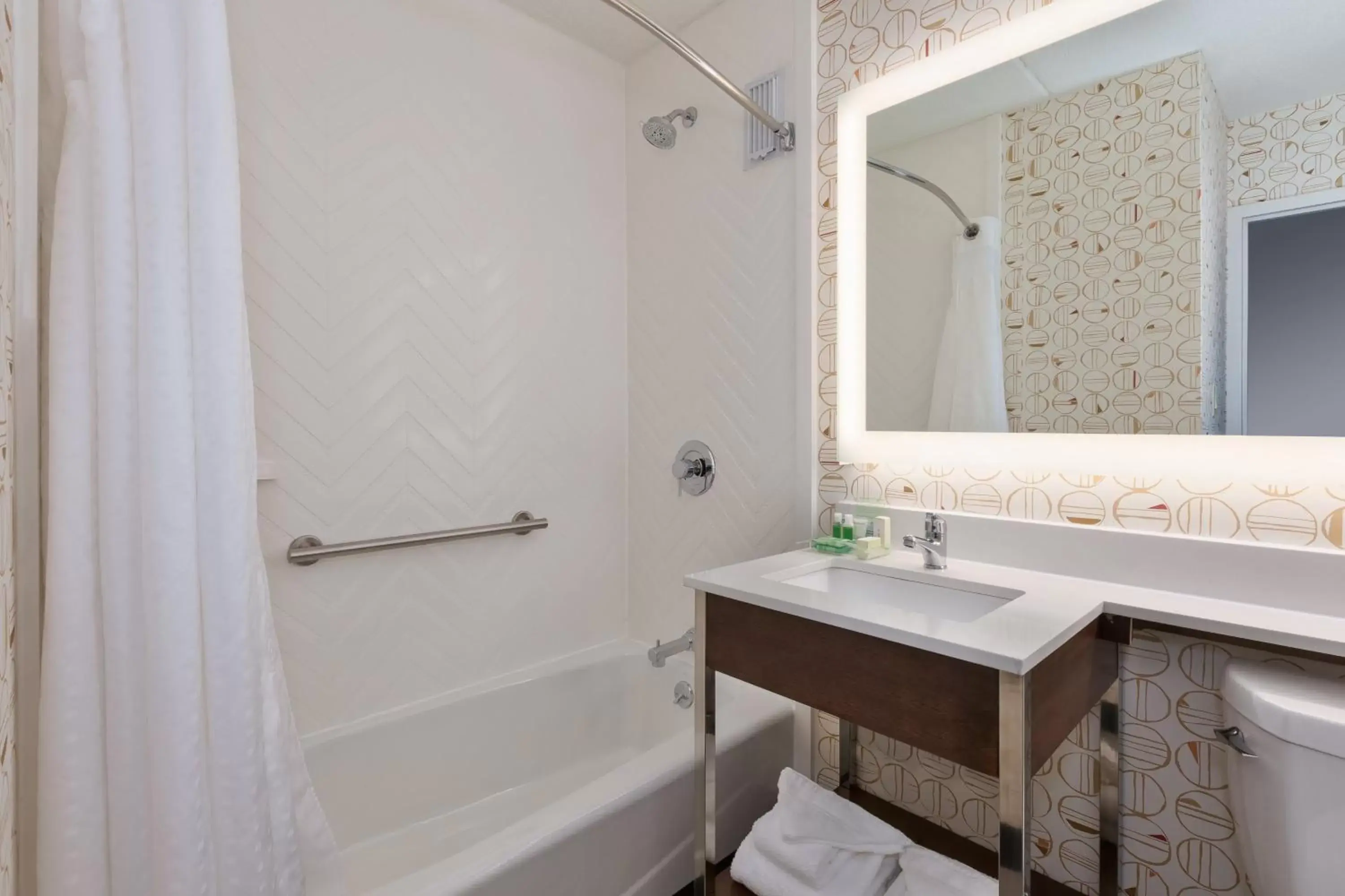 Bathroom in Holiday Inn Westbury-Long Island, an IHG Hotel