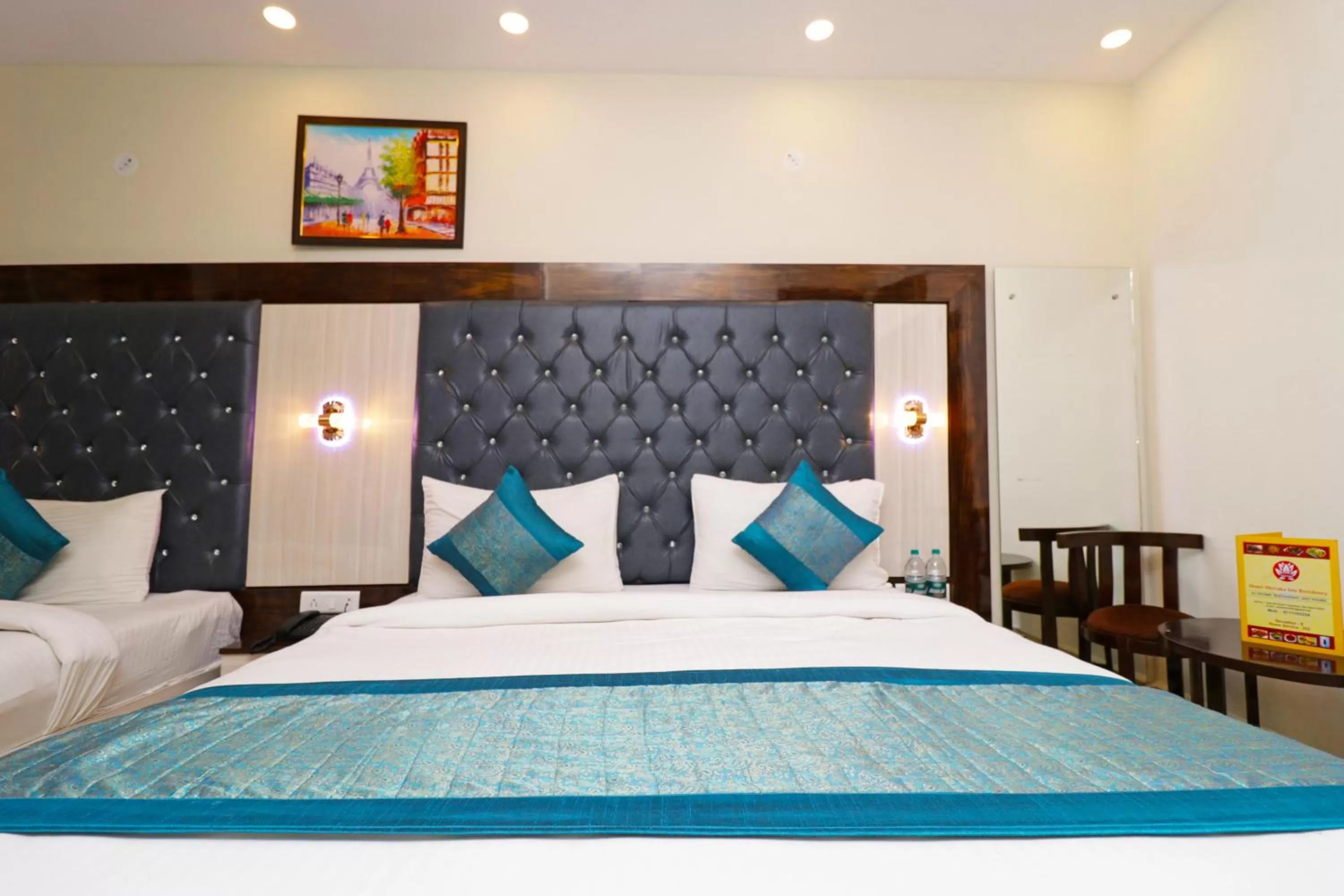 Photo of the whole room, Bed in Airport Hotel Shivaka Inn