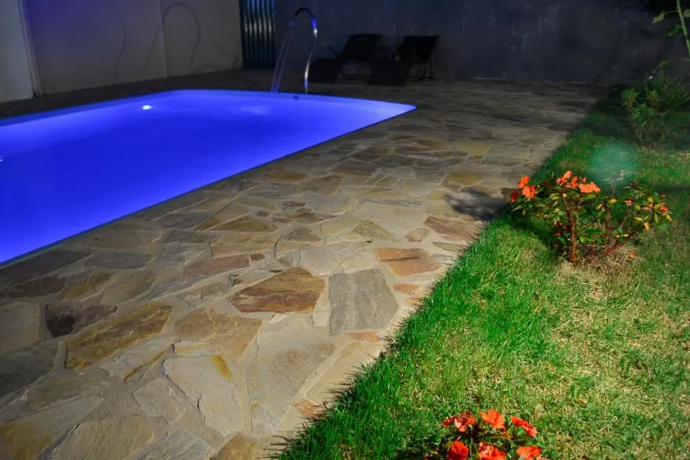 Swimming Pool in Pousada Vila Real Flats