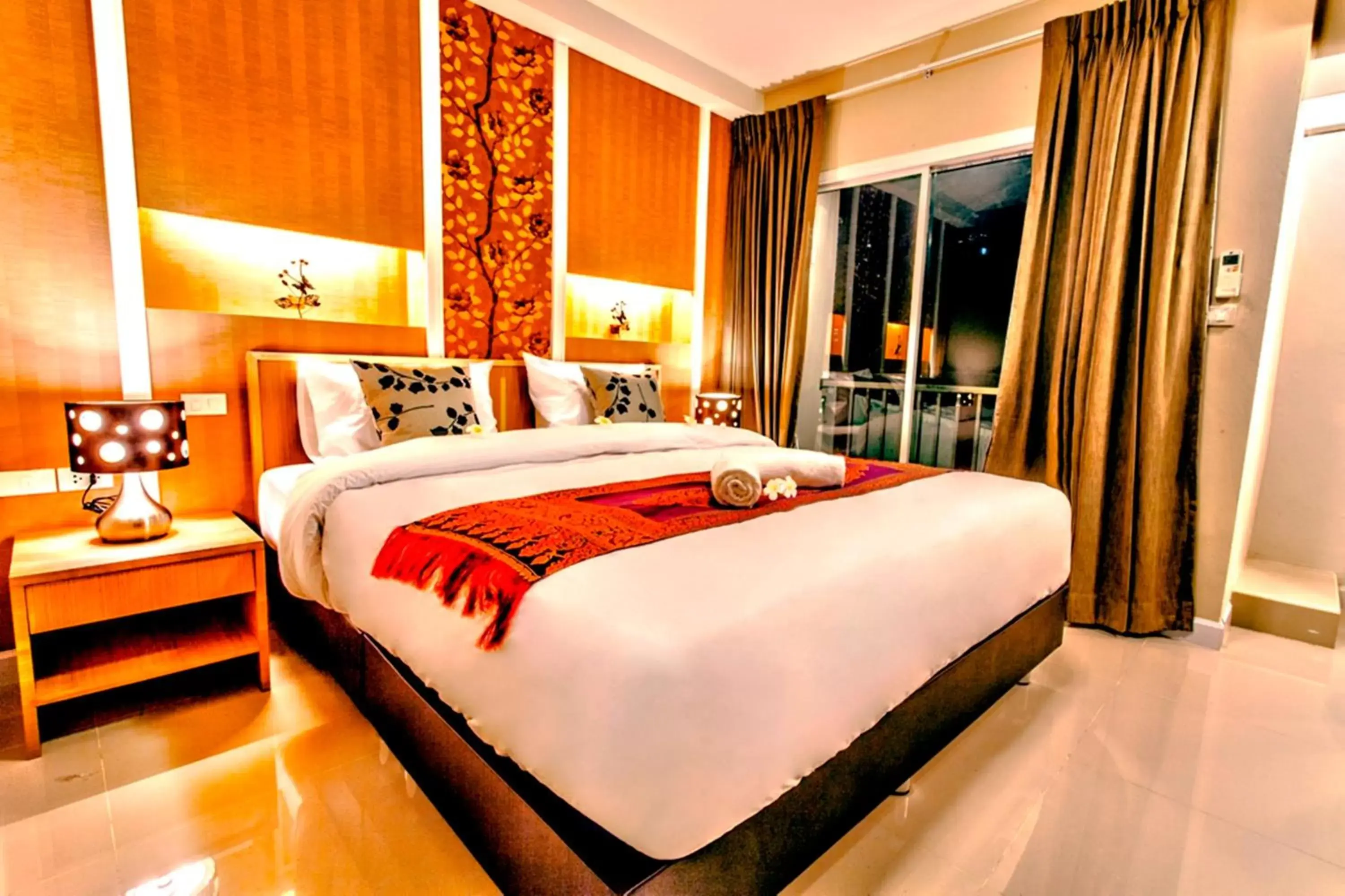 Photo of the whole room, Bed in The Aim Sathorn Hotel