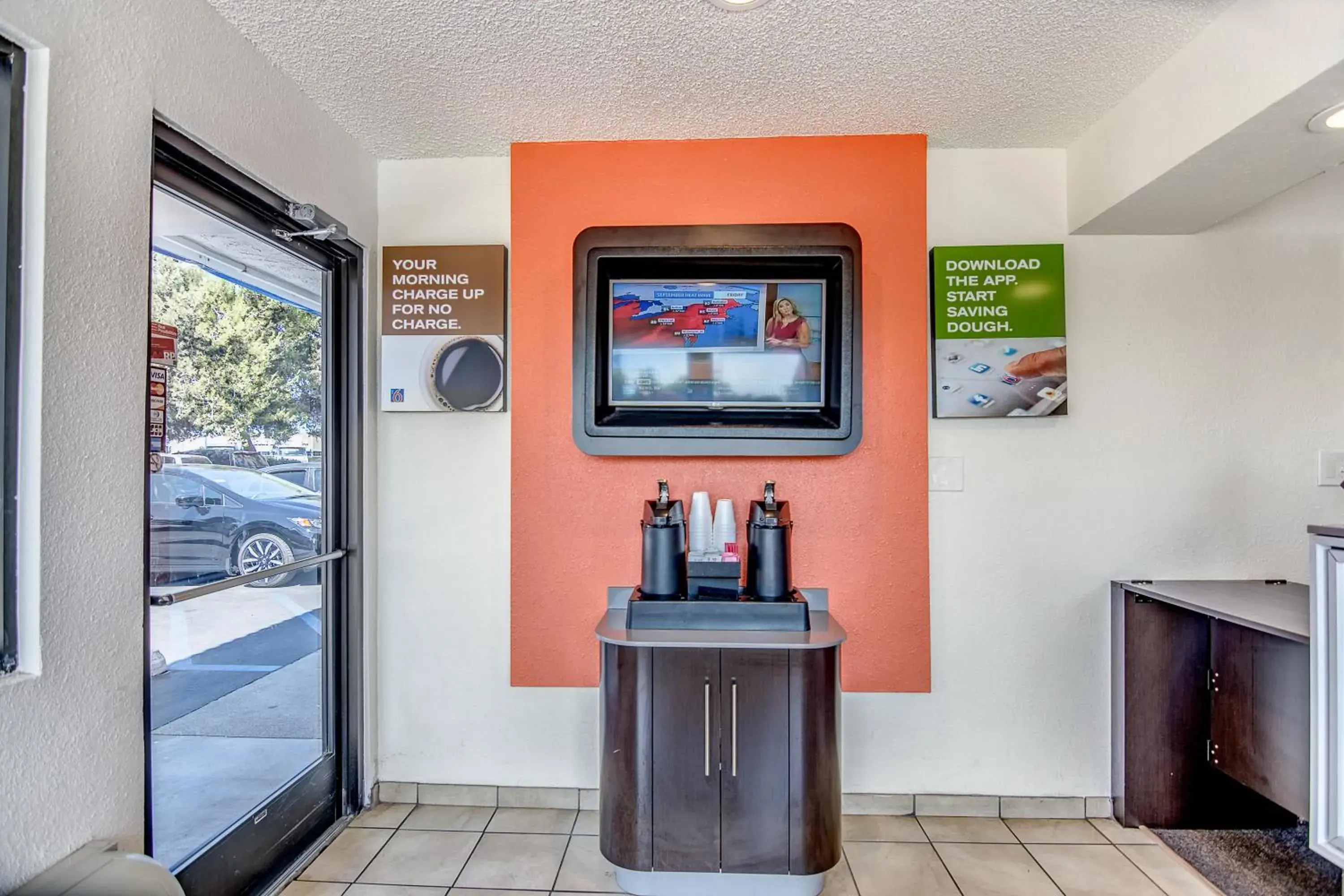 Lobby or reception, TV/Entertainment Center in Motel 6-Stockton, CA - Charter Way West