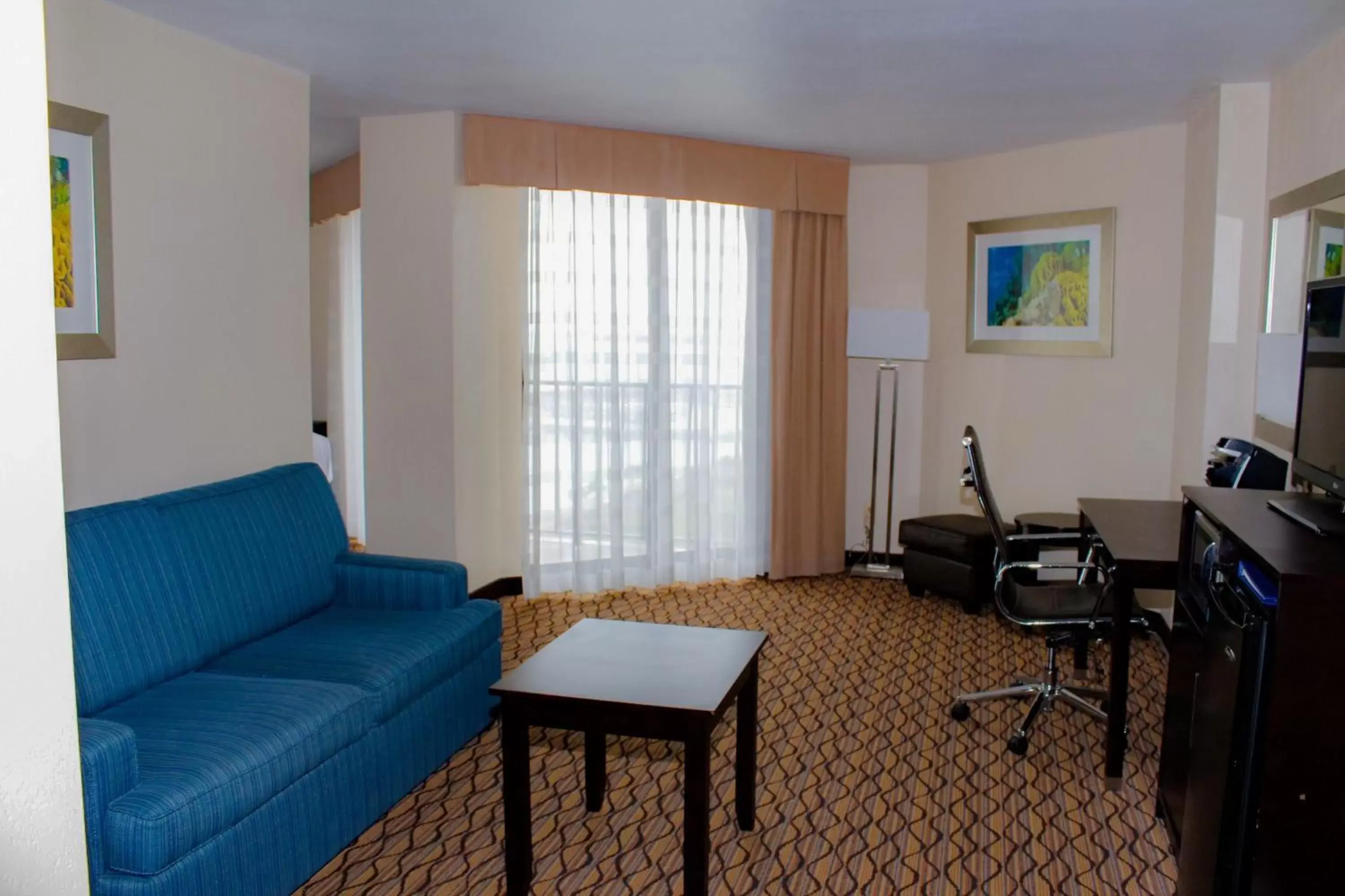 Bedroom, Seating Area in Holiday Inn Corpus Christi Downtown Marina, an IHG Hotel