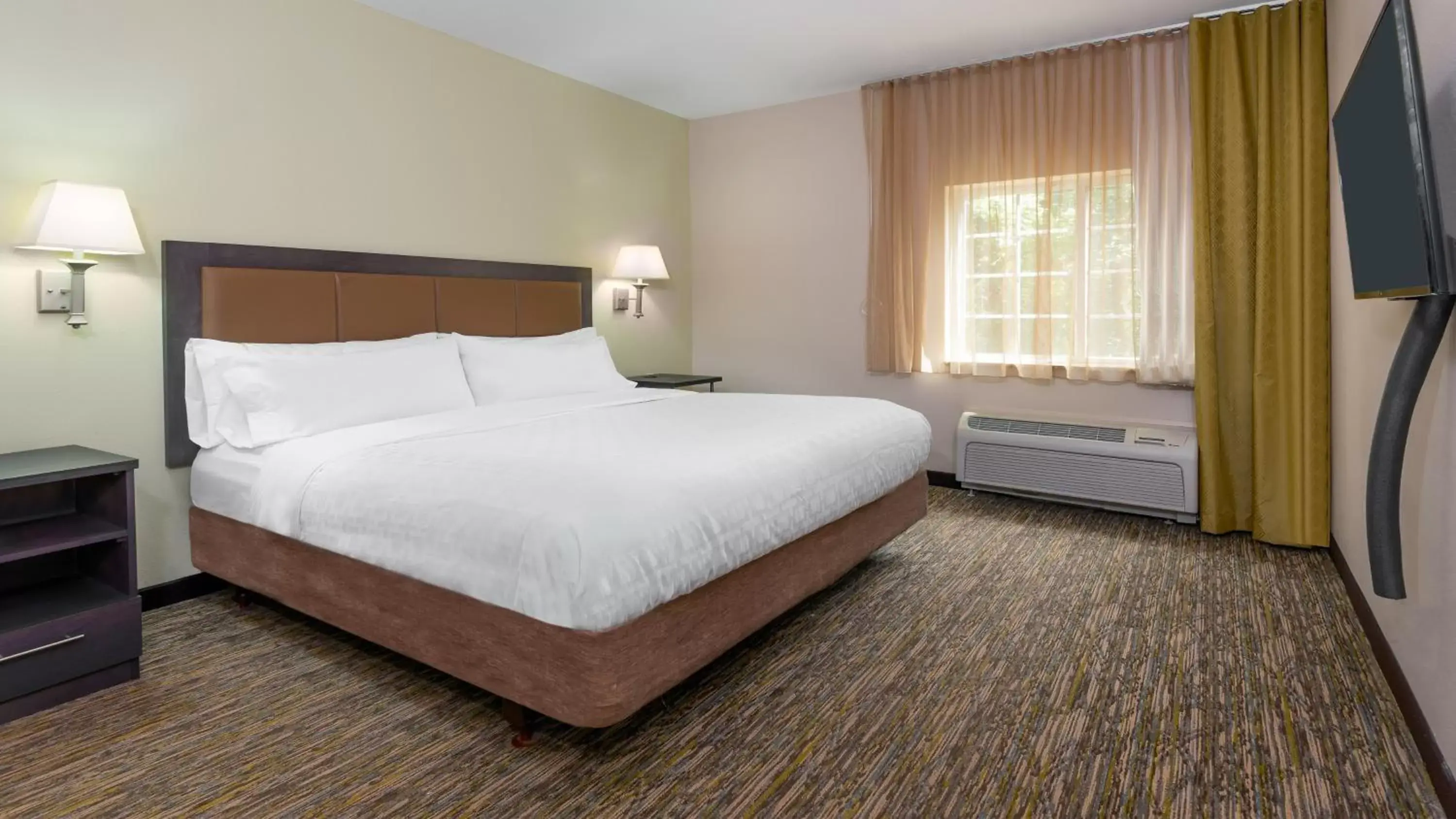 Photo of the whole room, Bed in Candlewood Suites Athens, an IHG Hotel