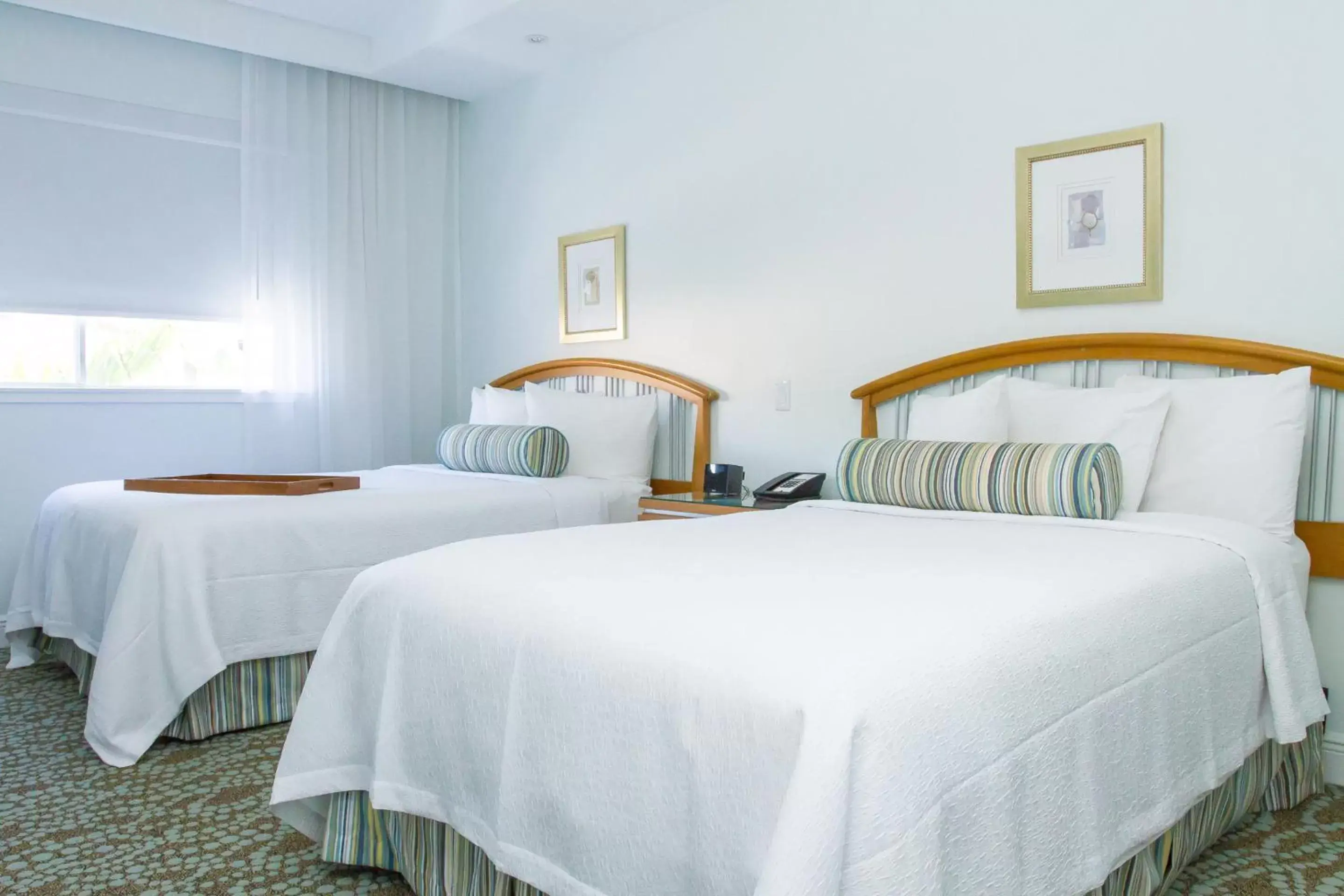 Bed in Dorchester Hotel & Suites