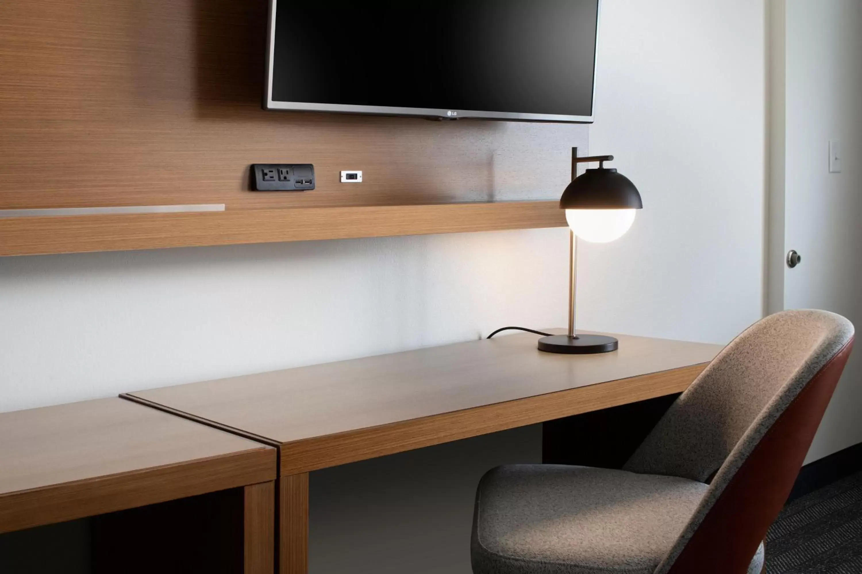 Photo of the whole room, TV/Entertainment Center in Courtyard by Marriott Lubbock Downtown/University Area