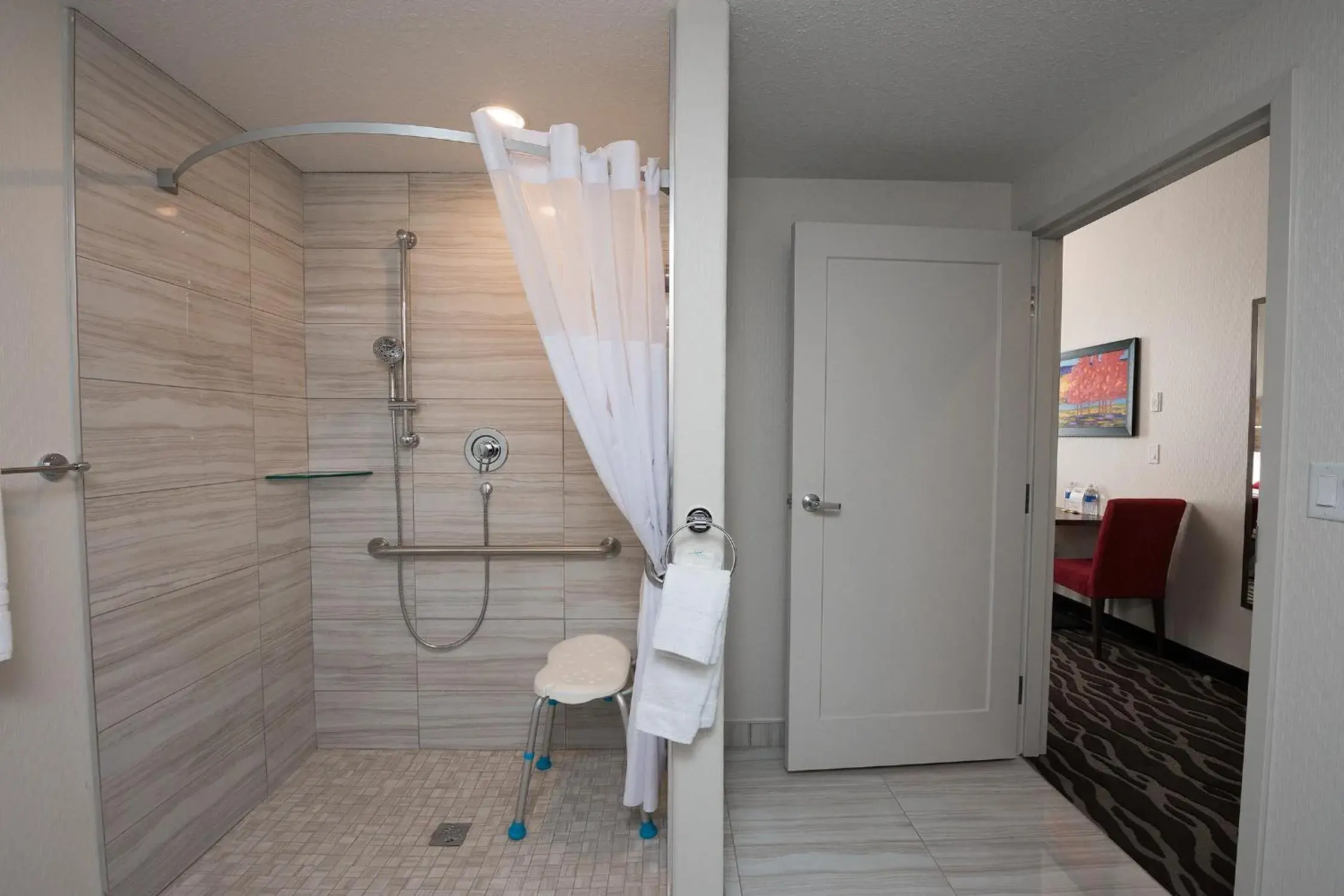 Bathroom in Encore Suites by Service Plus Inns
