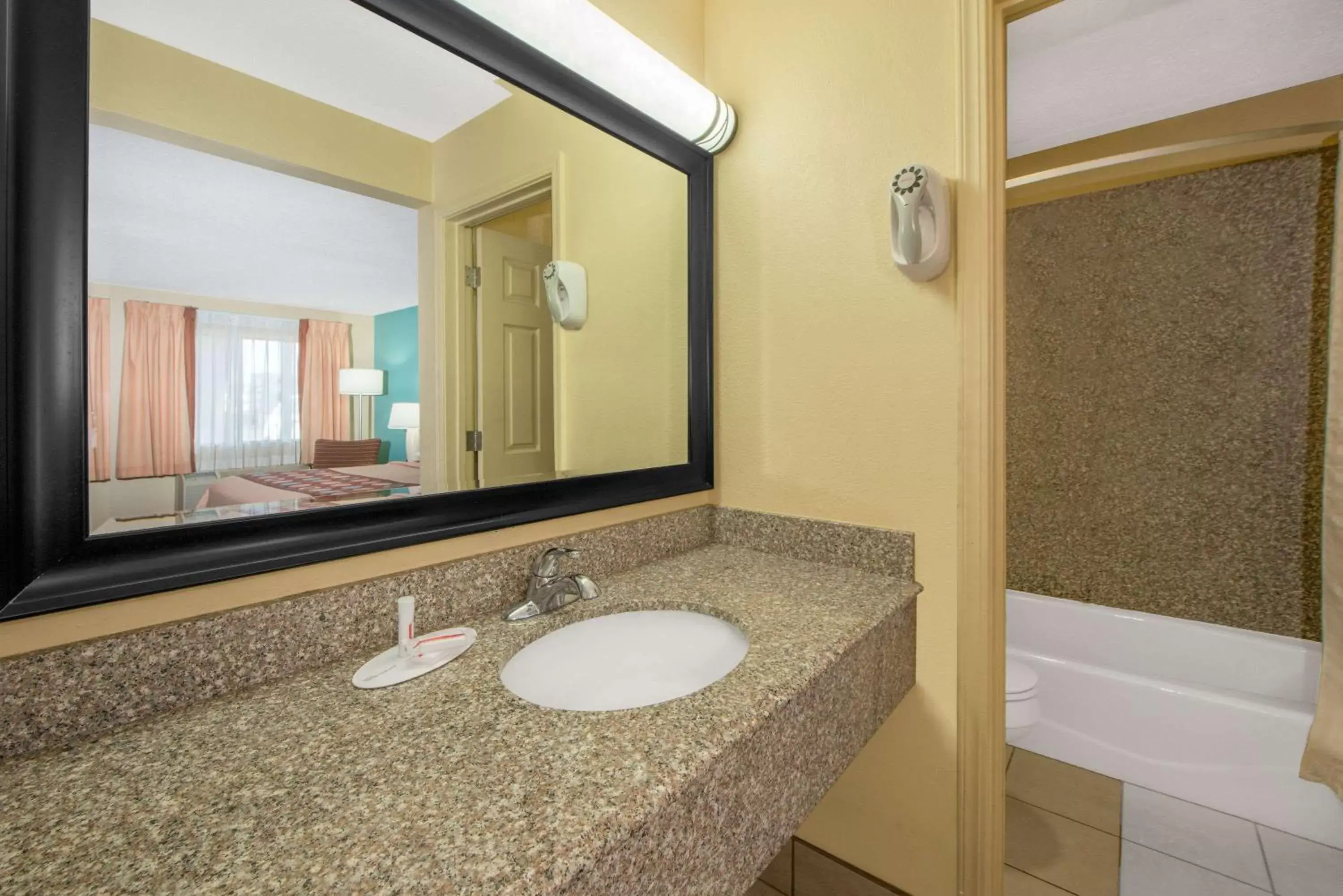 Bathroom in Super 8 by Wyndham Tulsa