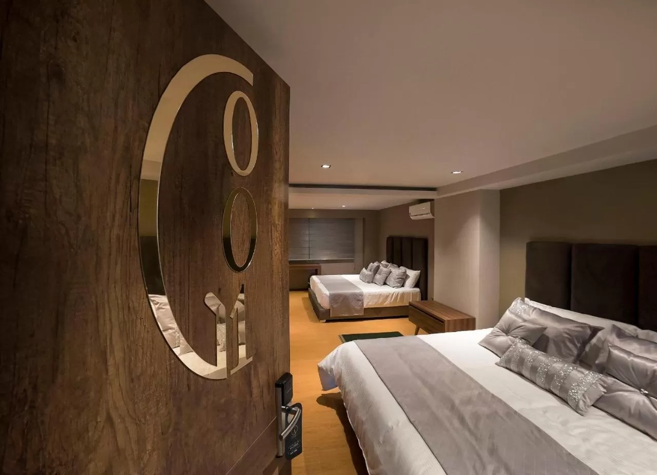 Bed, Room Photo in Albura Hotel