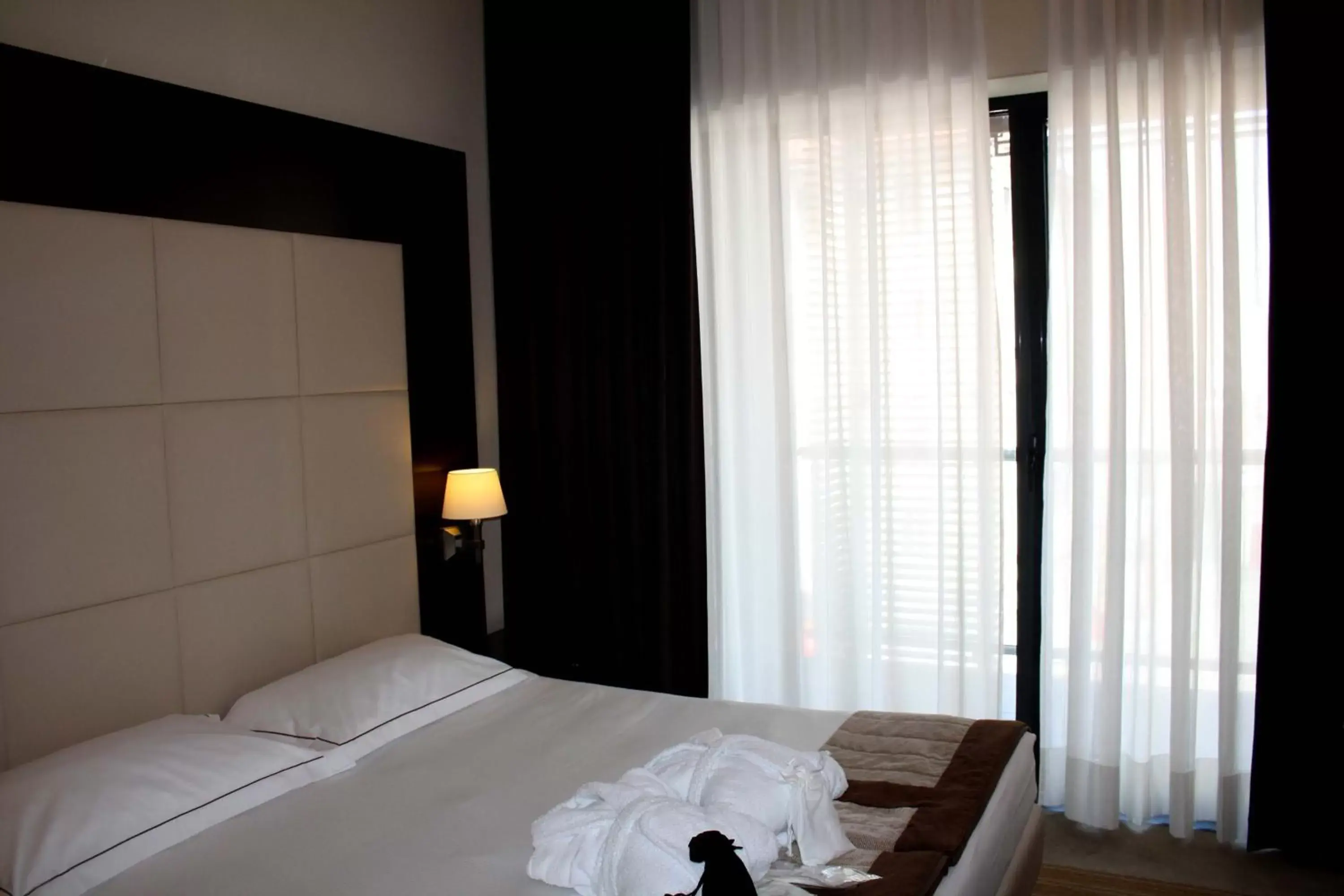 Bed in iH Hotels Milano Watt 13