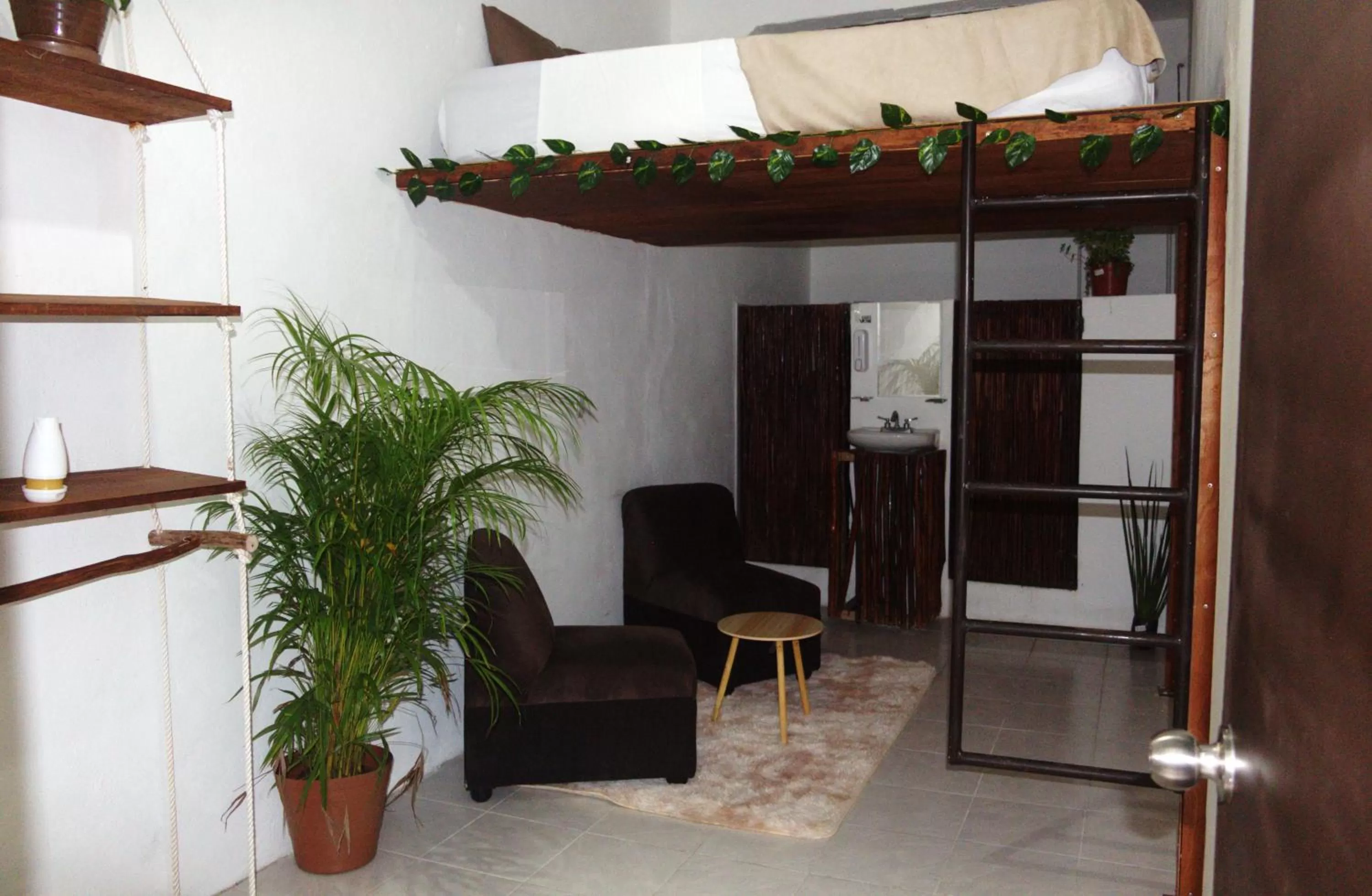 Bed, Seating Area in Hotel Casa de luz Playa del Carmen