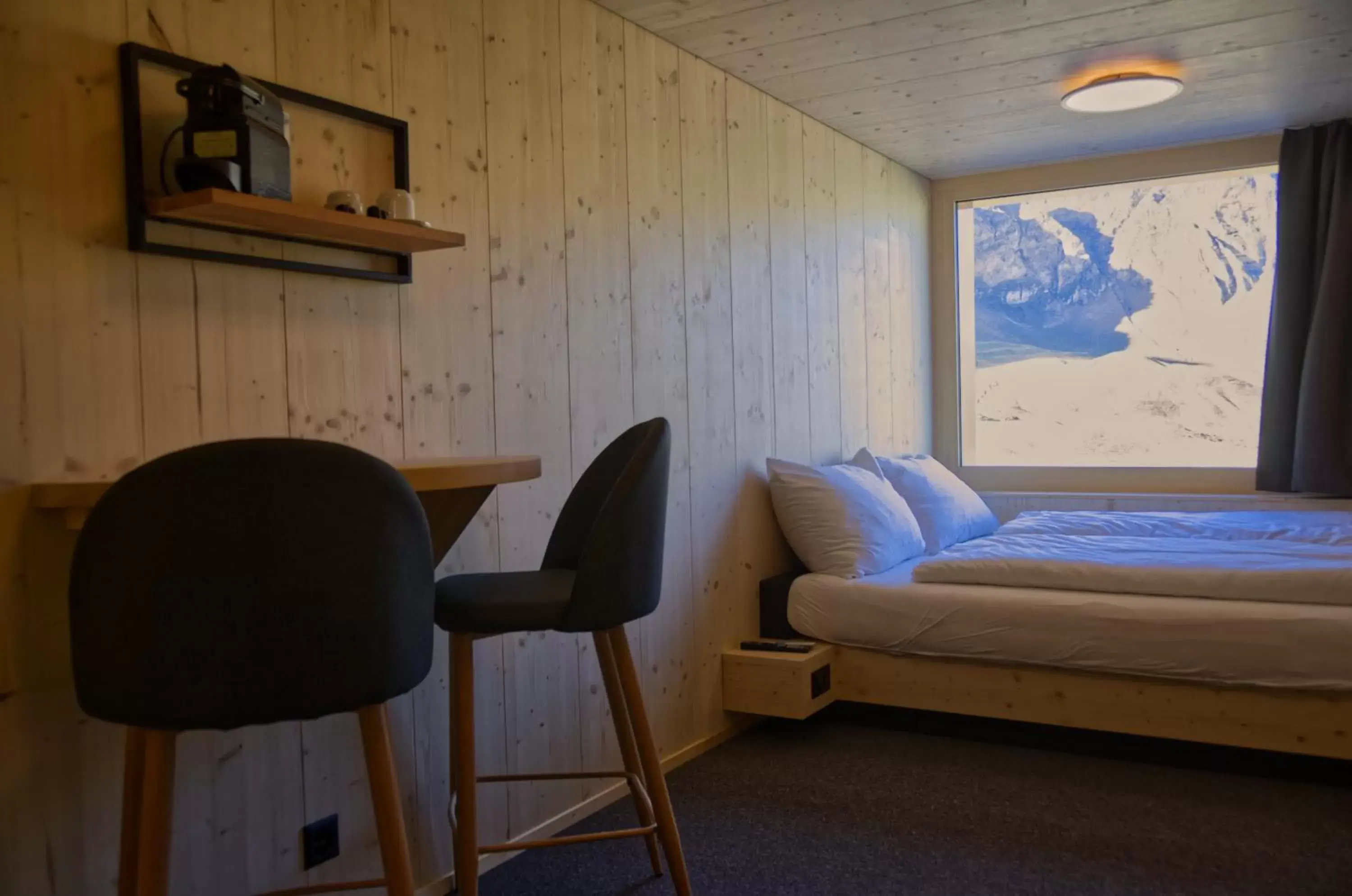 Double Room with Mountain View in Frutt Living Double Room with Mountain View in Frutt Living