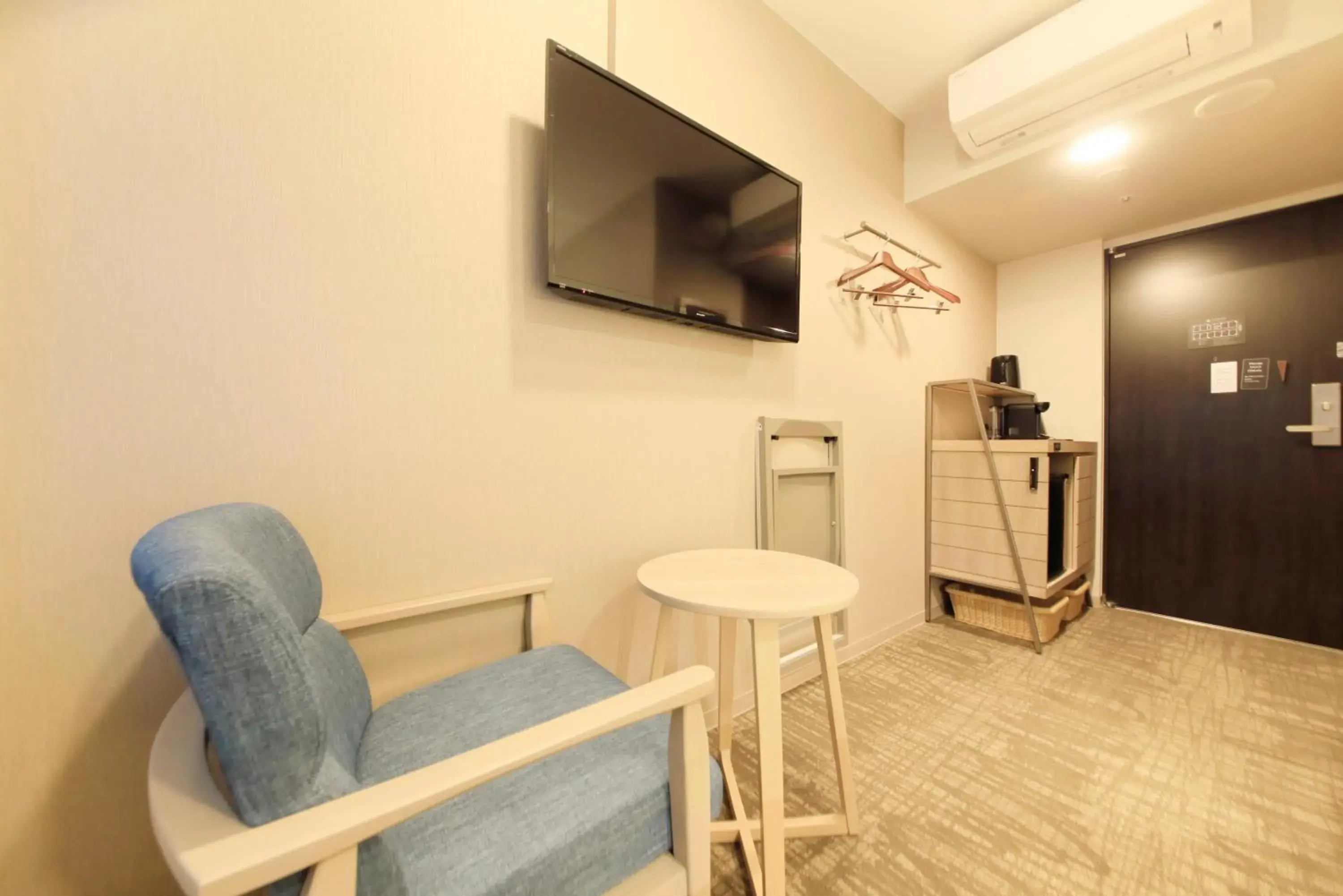 Bedroom, TV/Entertainment Center in S-peria Inn Osaka Hommachi