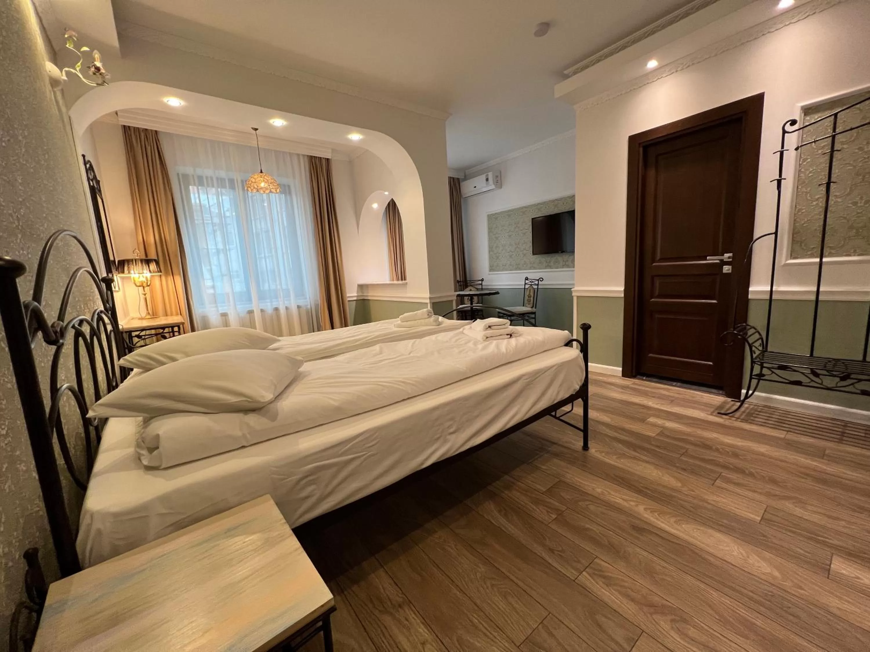 Photo of the whole room, Bed in Hotel Boutique Cathedral Plaza Residences room for rent downtown