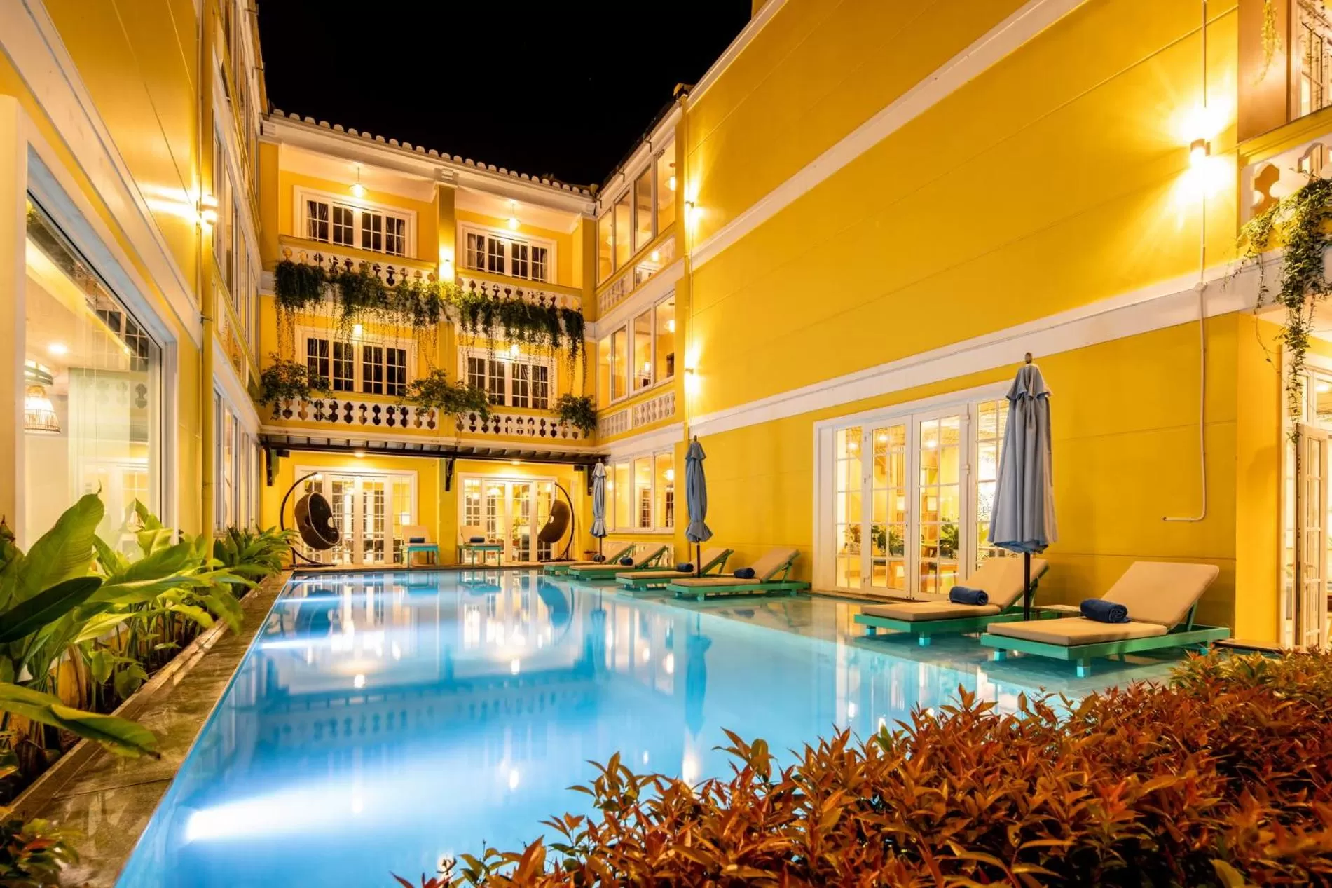 Property building, Swimming Pool in TRIPLE Riverside Villa Hotel HoiAn