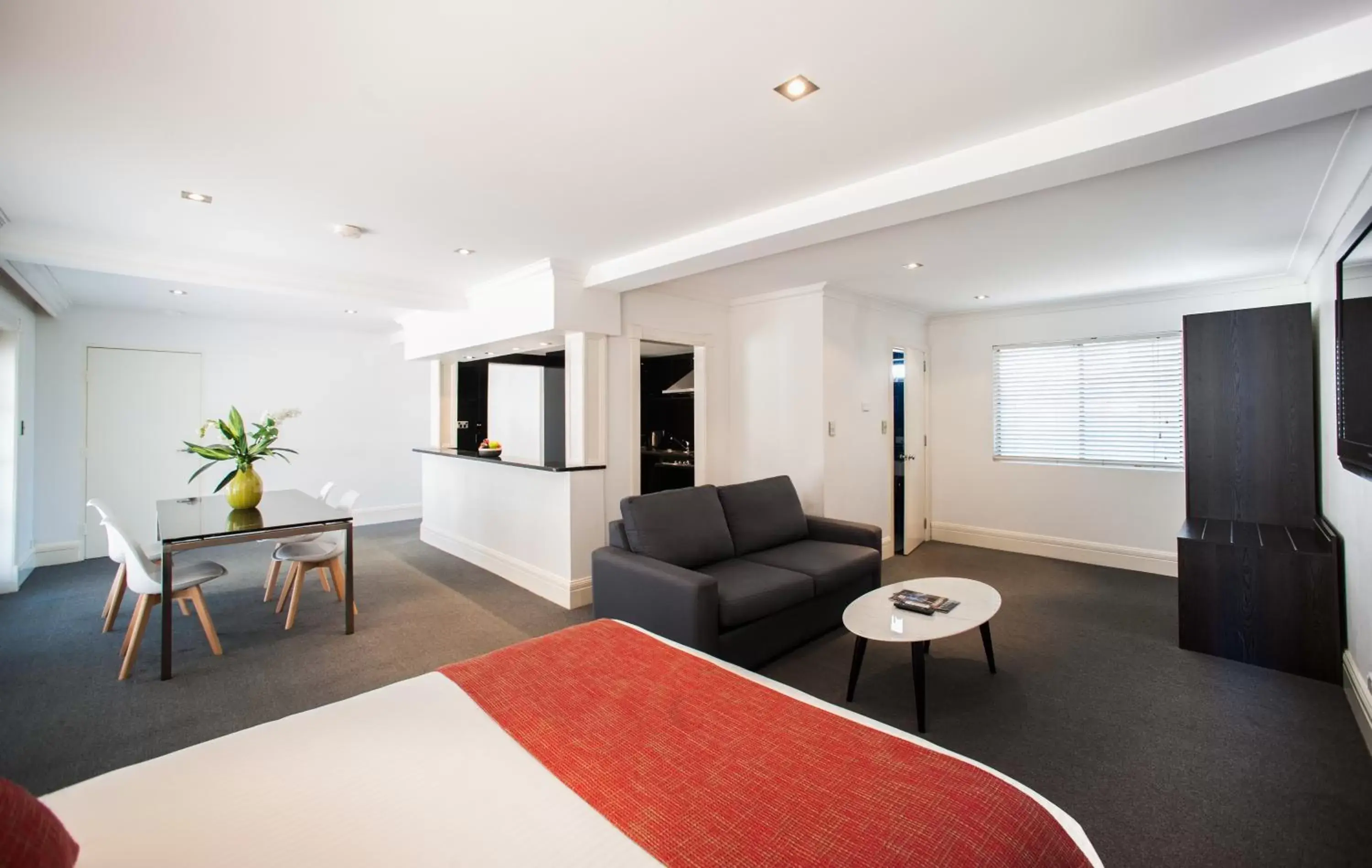 Living room, Bed in Ramada Hotel & Suites by Wyndham Cabramatta Living room, Bed in Ramada Hotel & Suites by Wyndham Cabramatta
