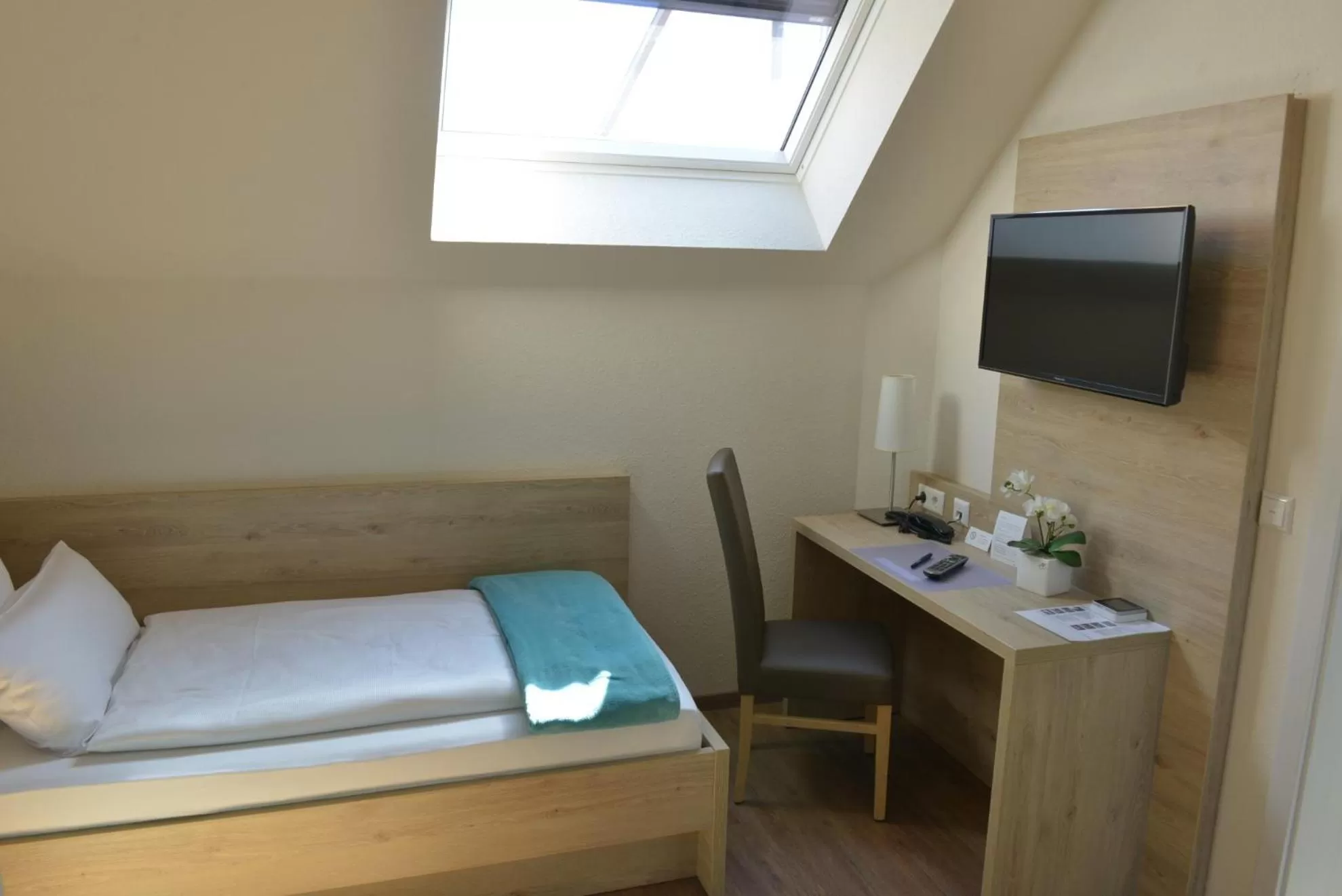 Photo of the whole room, Bed in Gästehaus Rothert