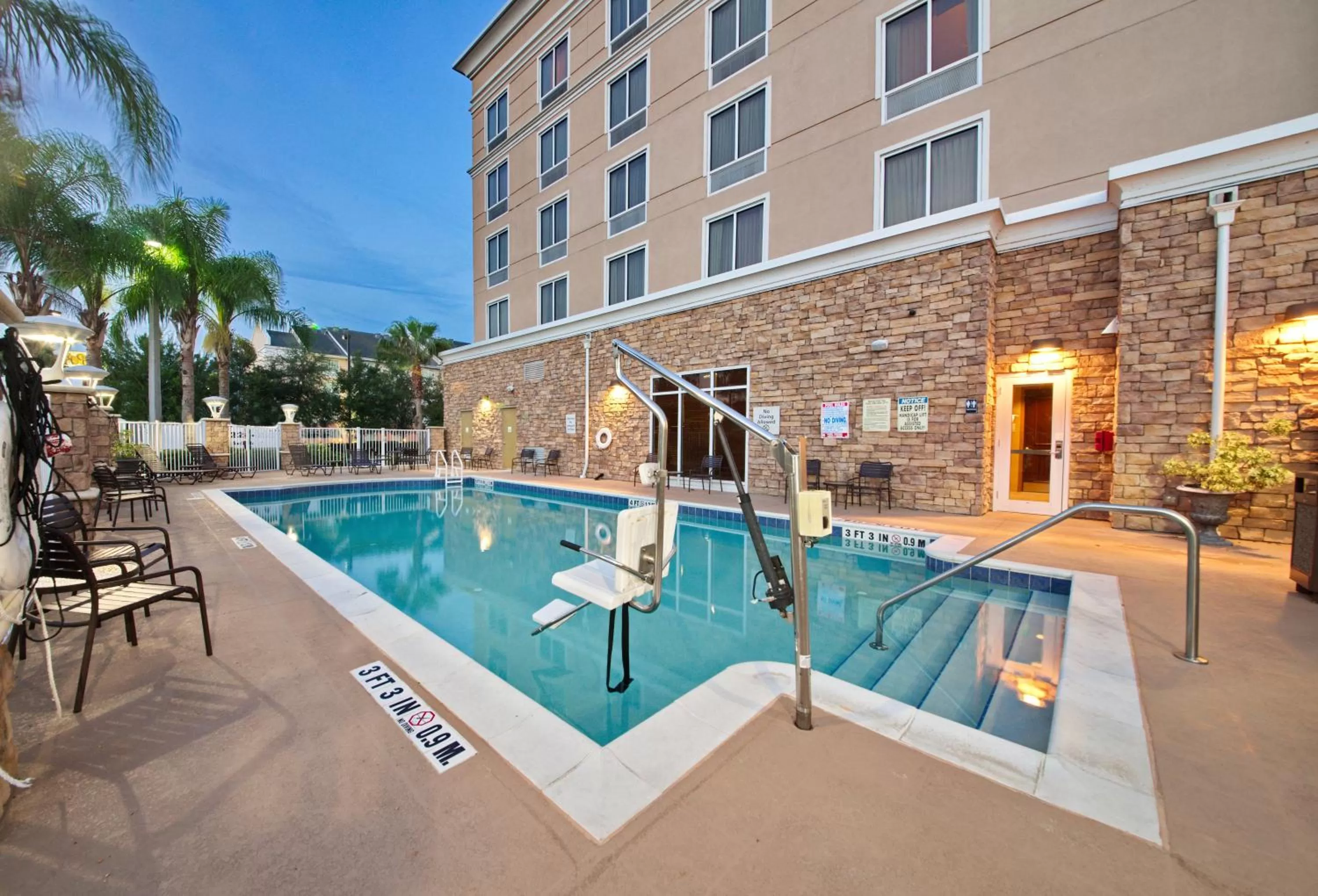 Swimming pool in Holiday Inn Titusville/Kennedy Space Center by IHG