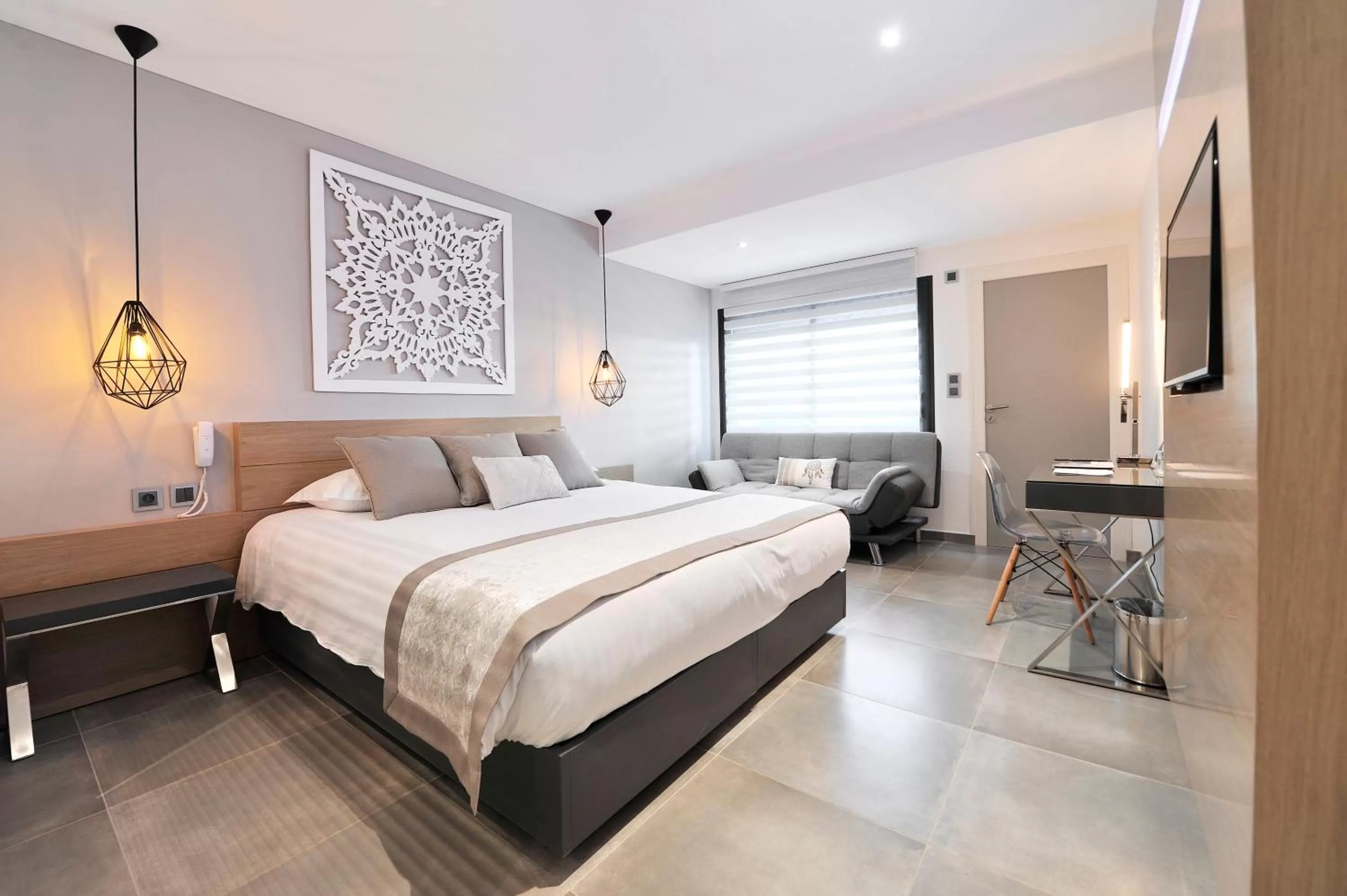 Seating area, Bed in Le Spinaker