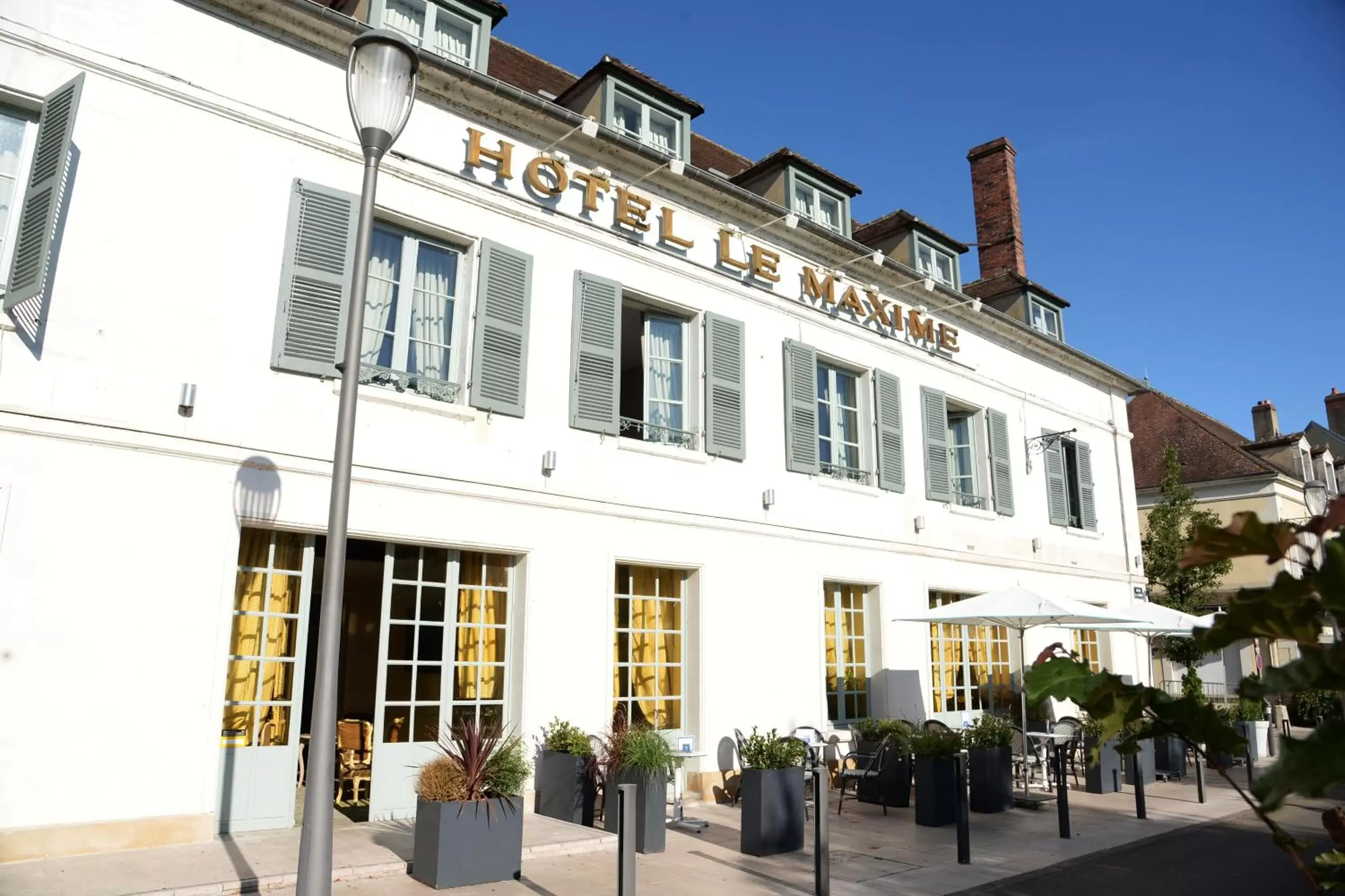 Property Building in Hôtel Le Maxime - Best Western Signature Collection
