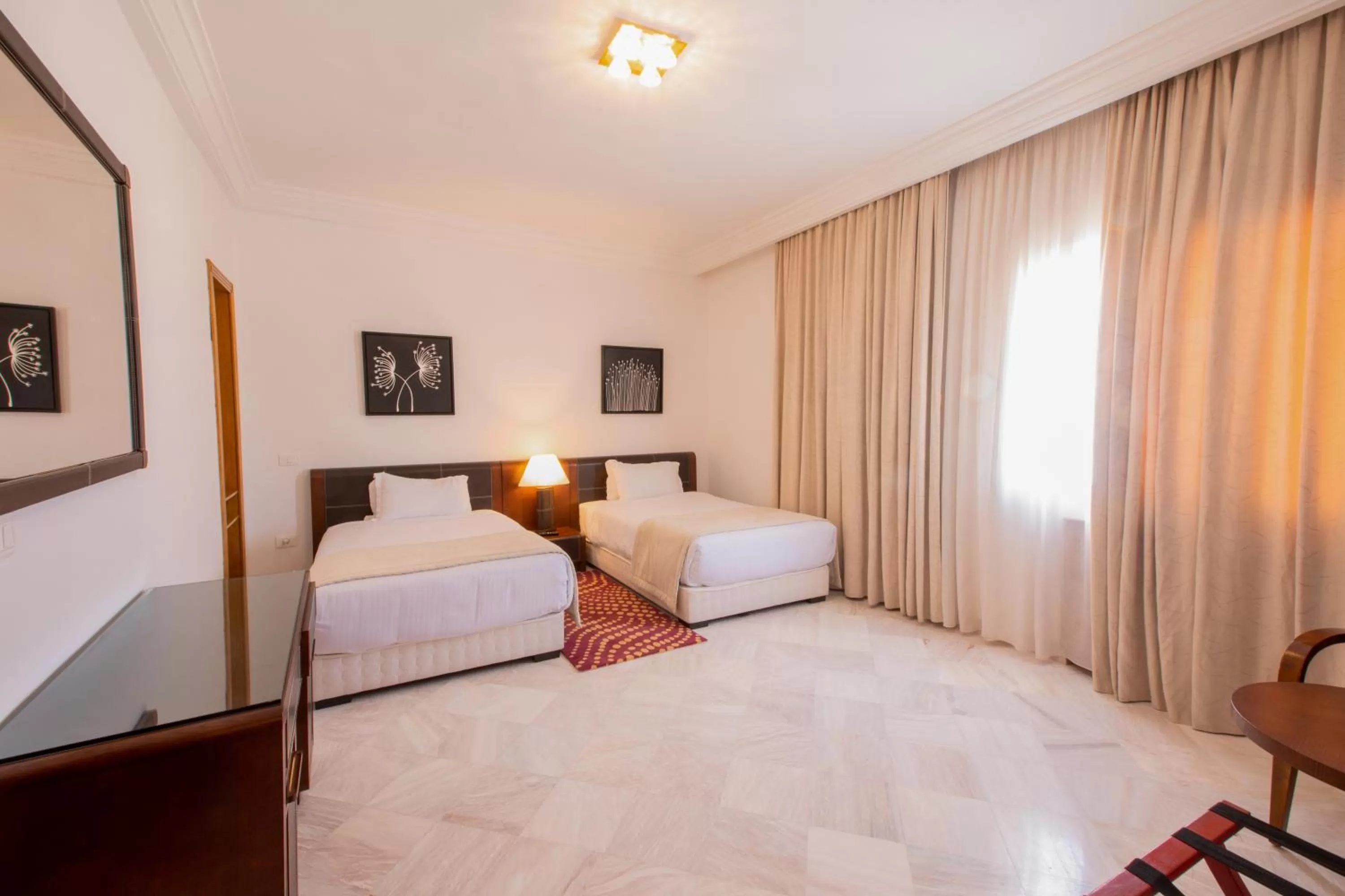 Bed in The Penthouse Suites Hotel