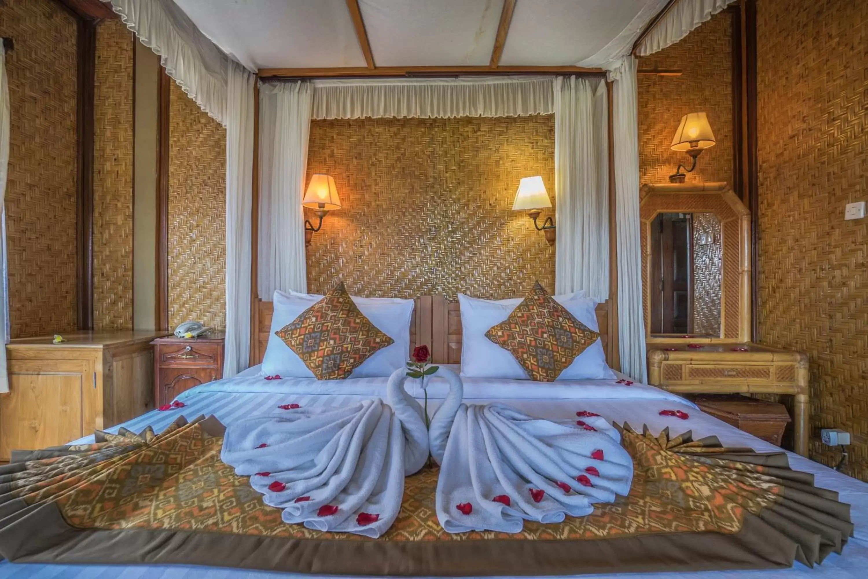 Bed in Cendana Resort & Spa by Mahaputra Bed in Cendana Resort & Spa by Mahaputra